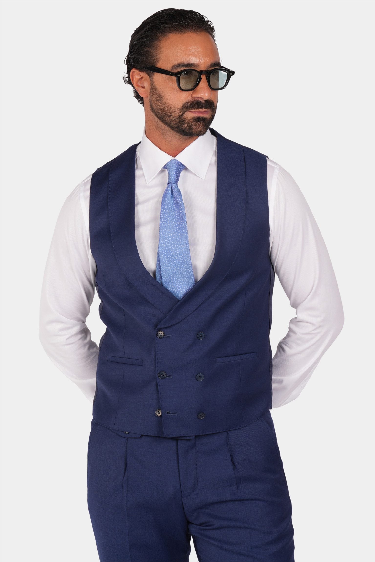 Blue slim fit three-piece wool suit
