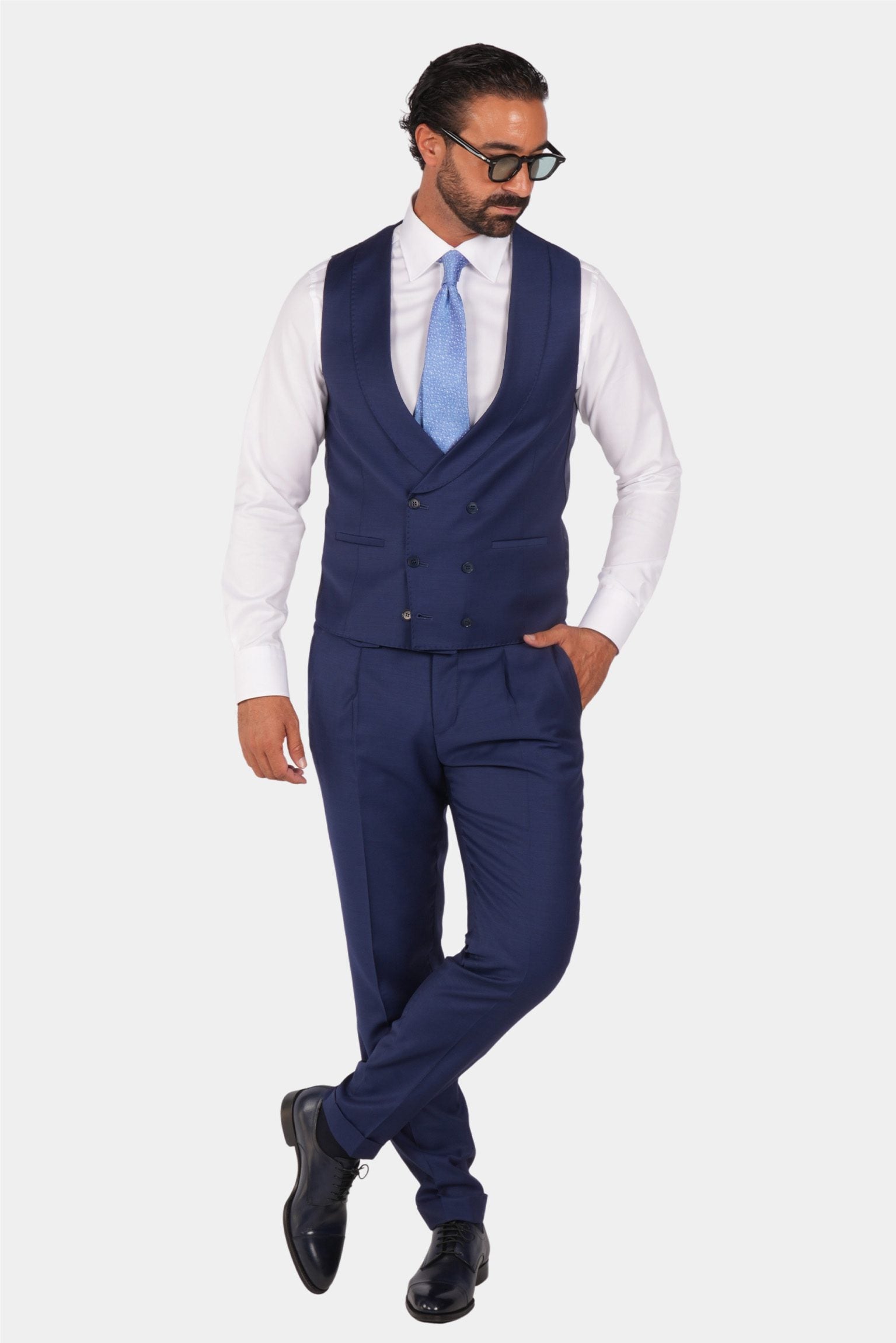 Blue slim fit three-piece wool suit