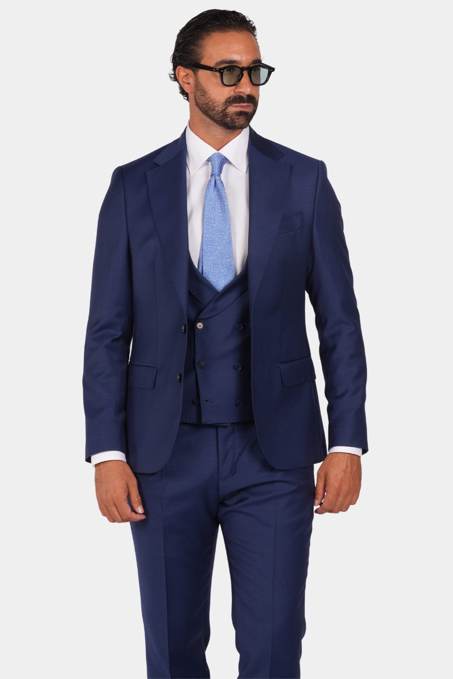 Blue slim fit three-piece wool suit