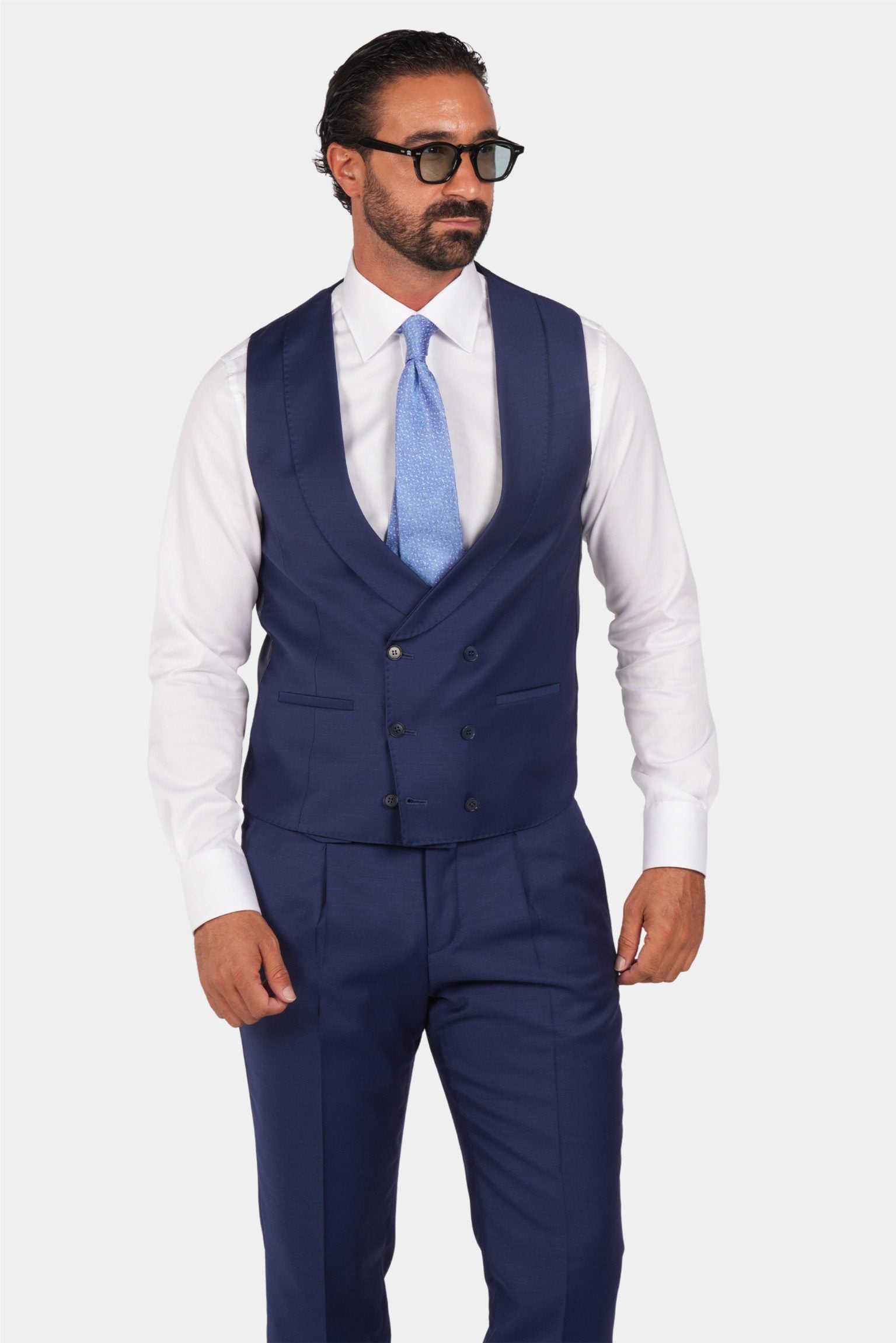 Blue slim fit three-piece wool suit
