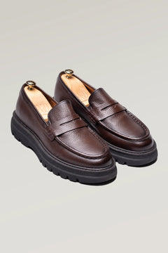 Brown deerskin penny loafer shoe