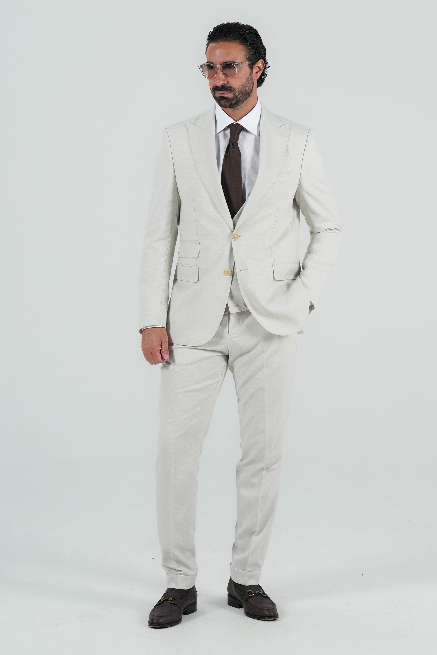 Beige three-piece microfiber suit with tailored fit