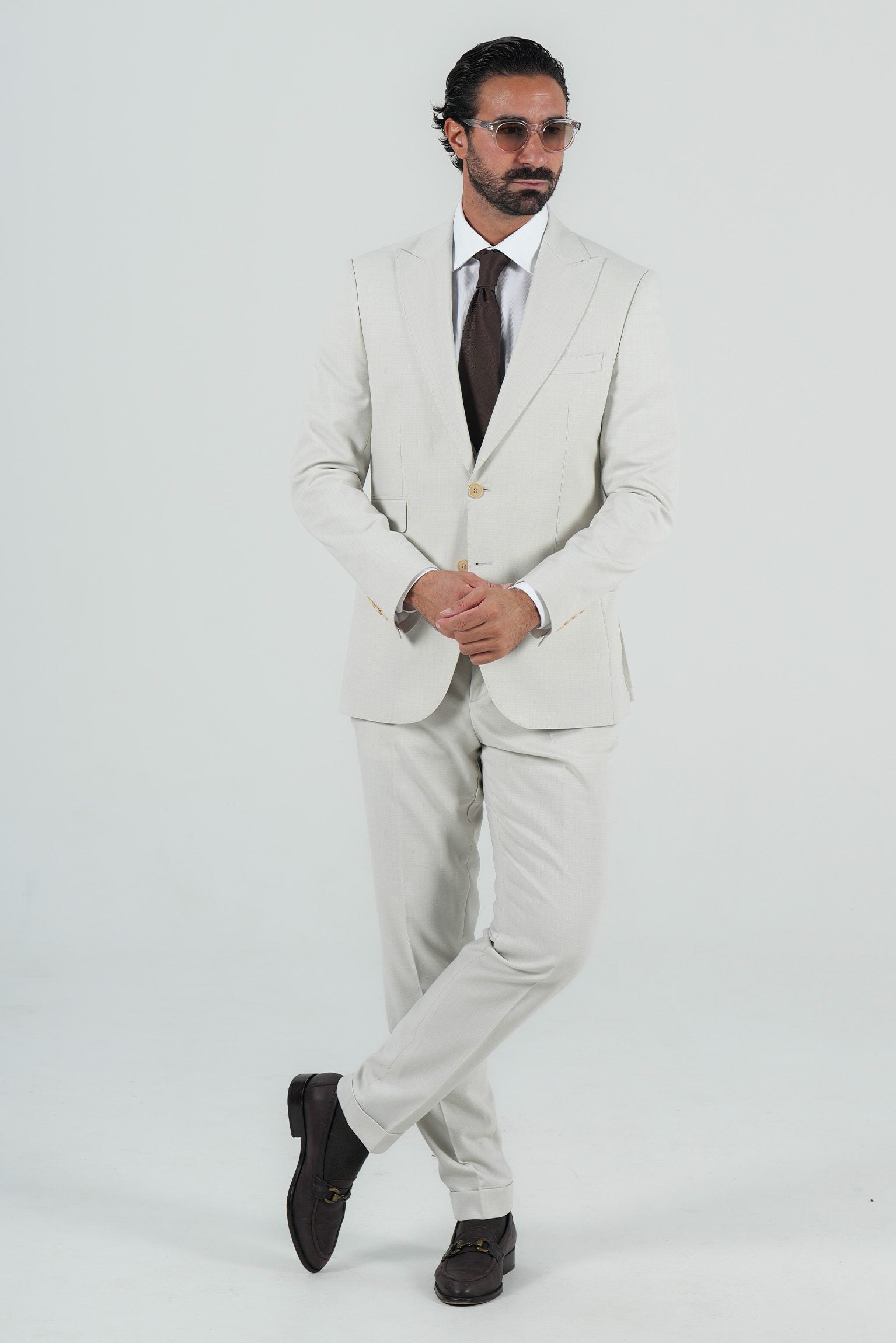 Beige three-piece microfiber suit with tailored fit