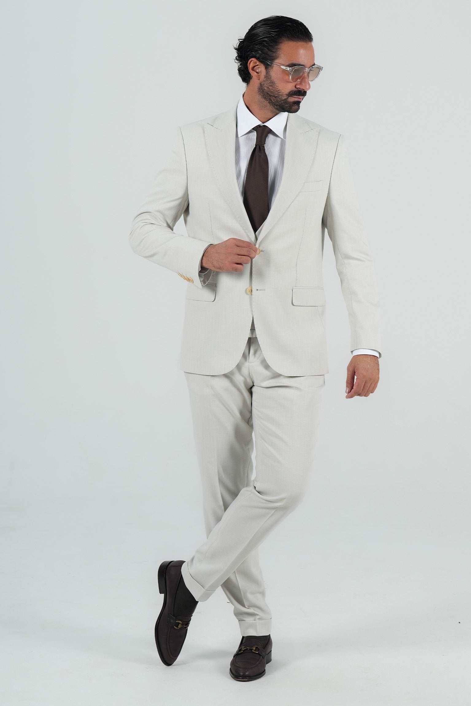 Beige three-piece microfiber suit with tailored fit