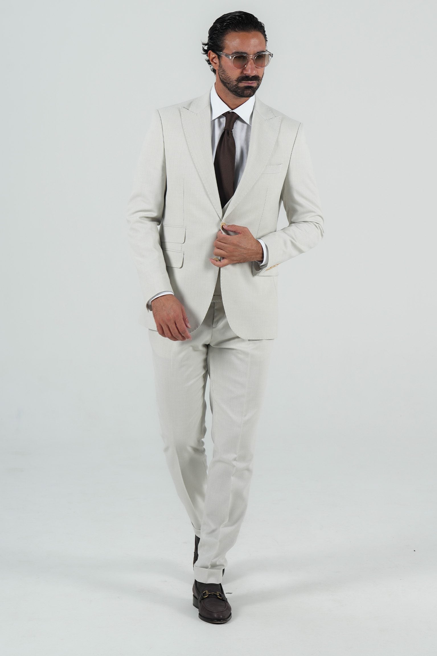 Beige three-piece microfiber suit with tailored fit