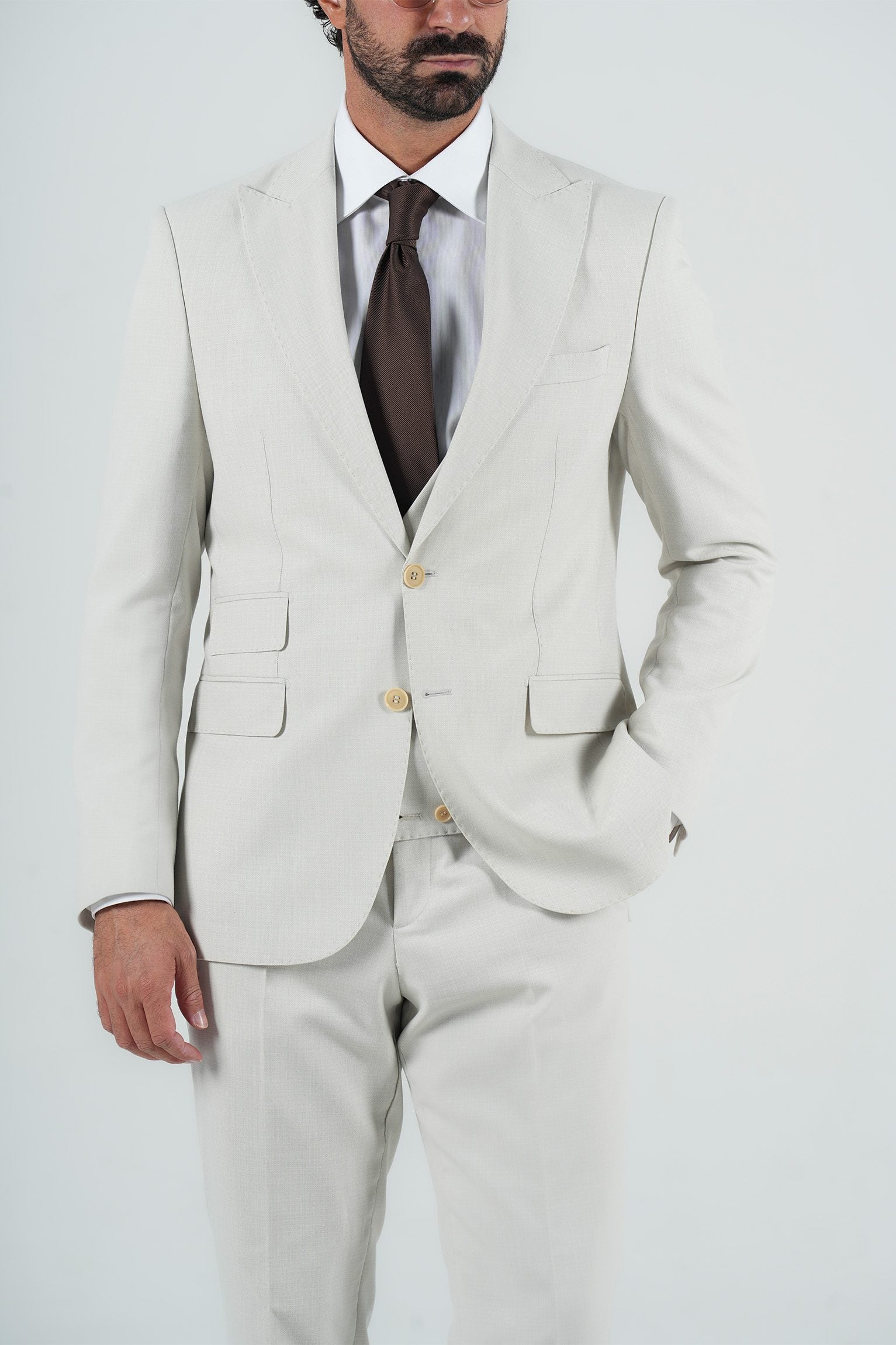 Beige three-piece microfiber suit with tailored fit