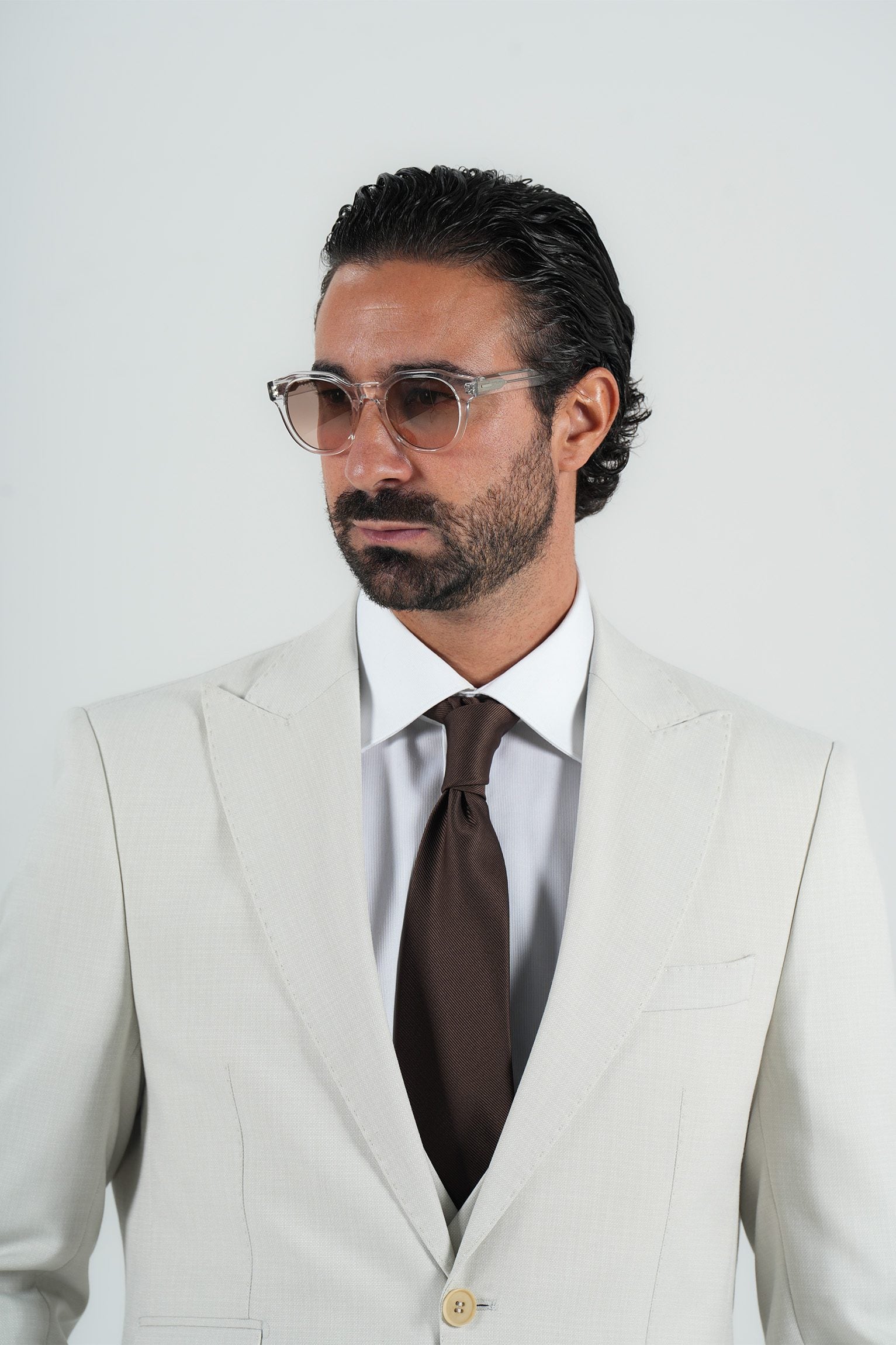 Beige three-piece microfiber suit with tailored fit