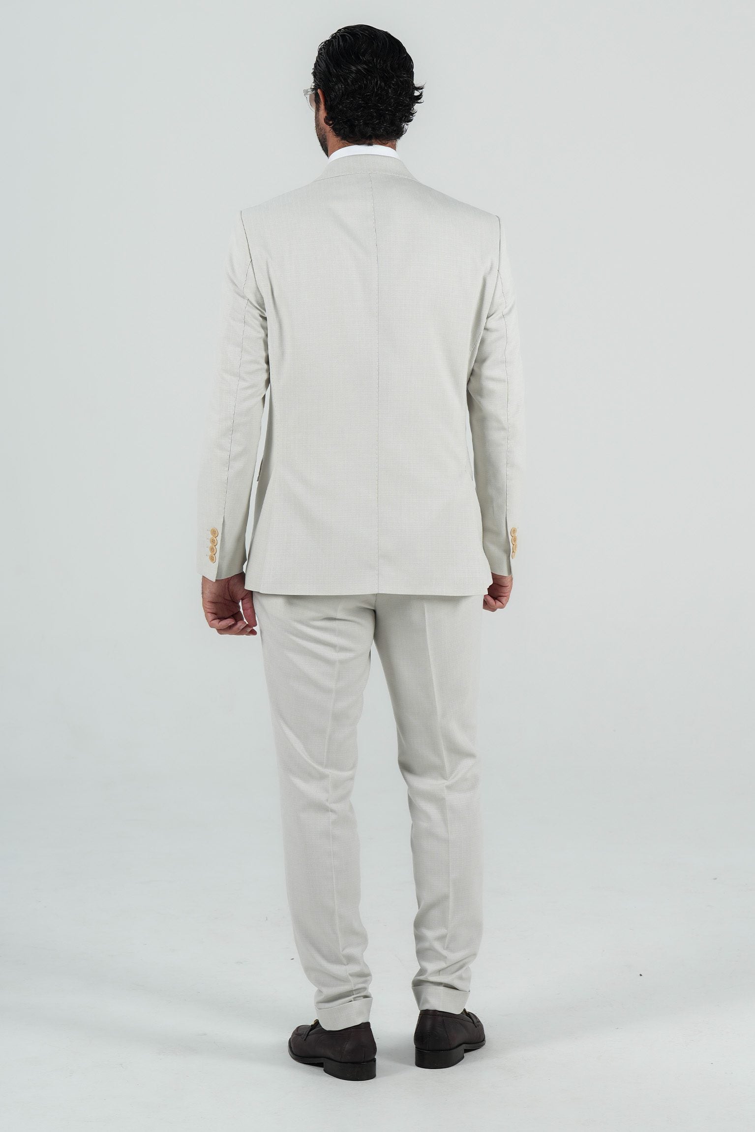 Beige three-piece microfiber suit with tailored fit
