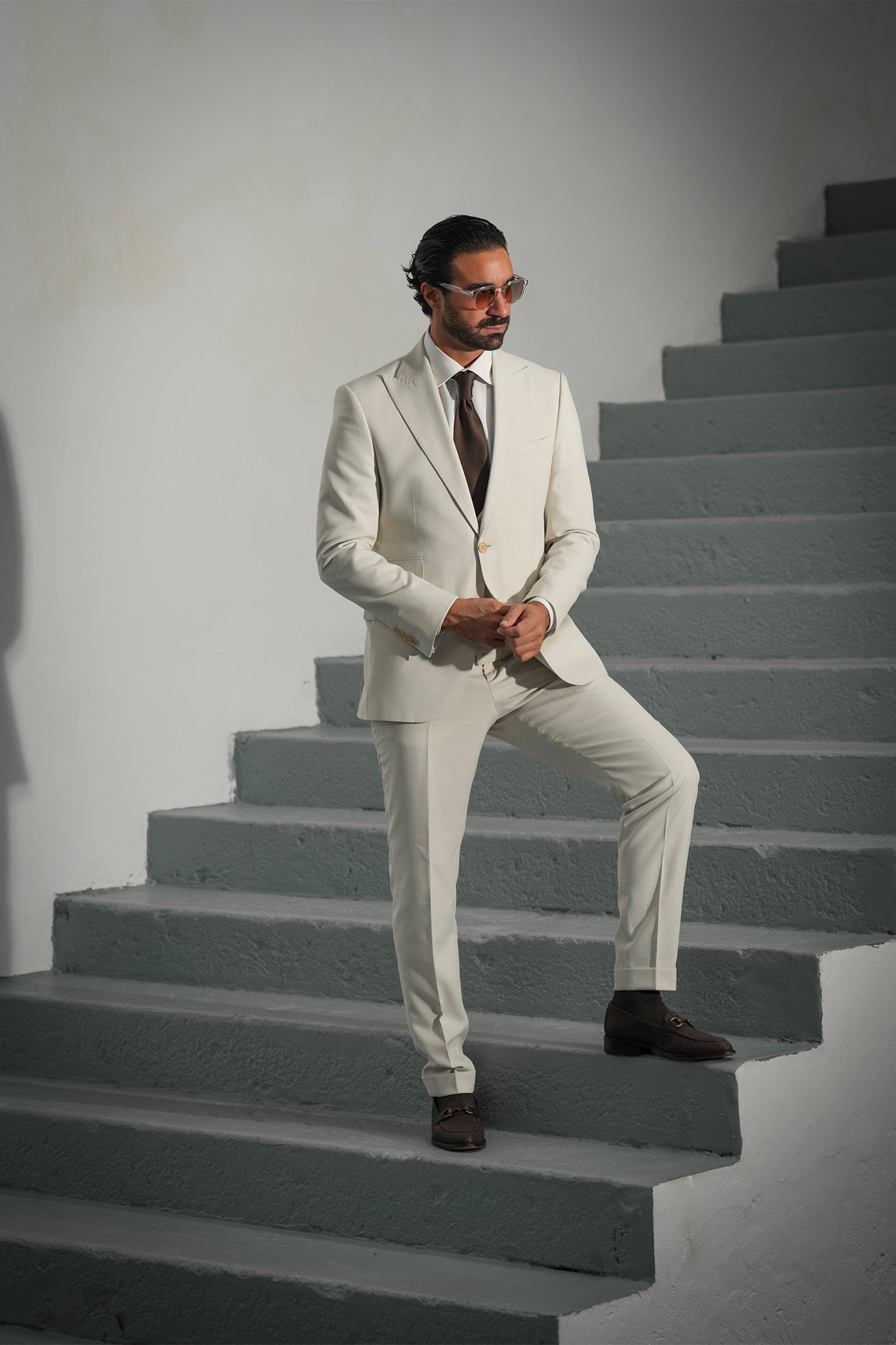 Beige three-piece microfiber suit with tailored fit