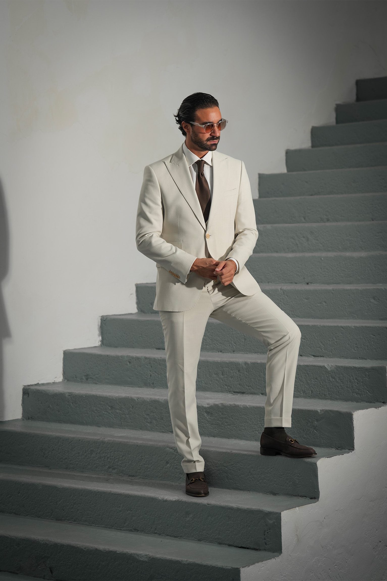 Beige three-piece microfiber suit with tailored fit