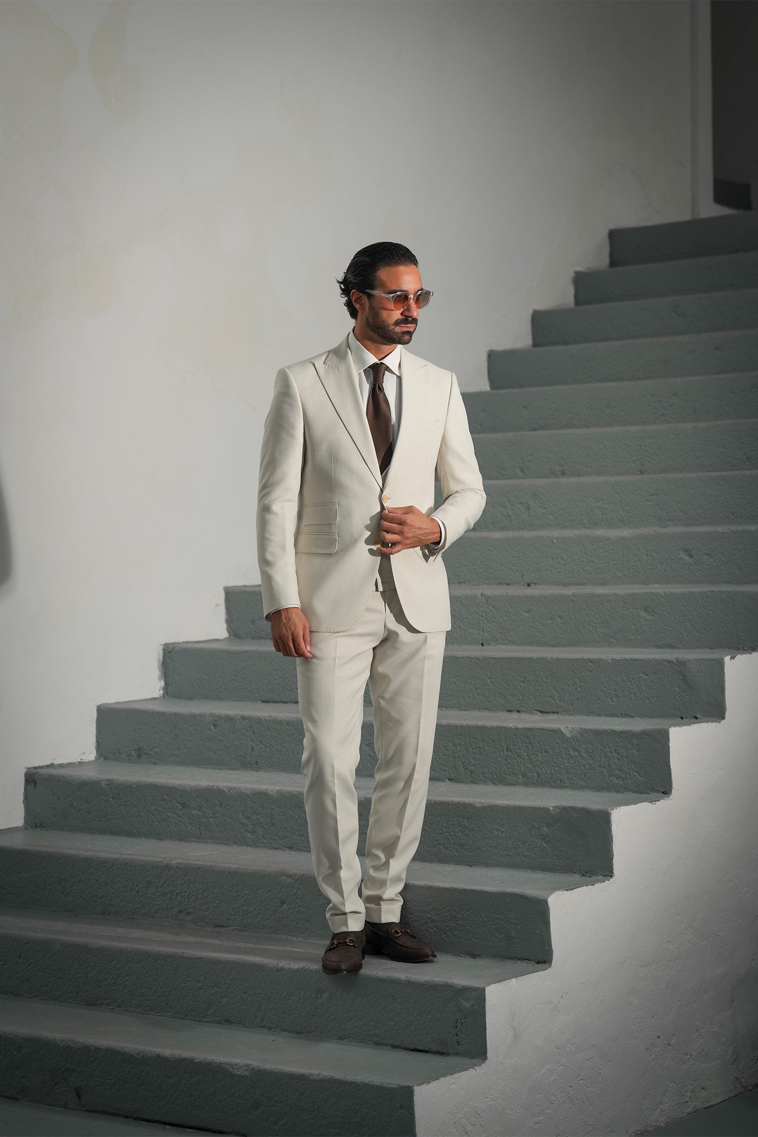 Beige three-piece microfiber suit with tailored fit