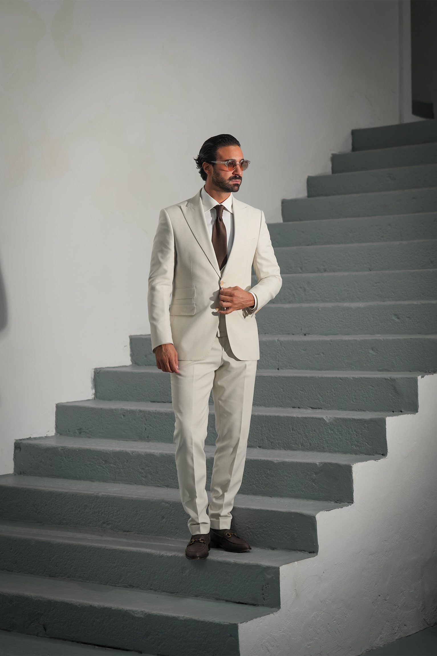 Beige three-piece microfiber suit with tailored fit