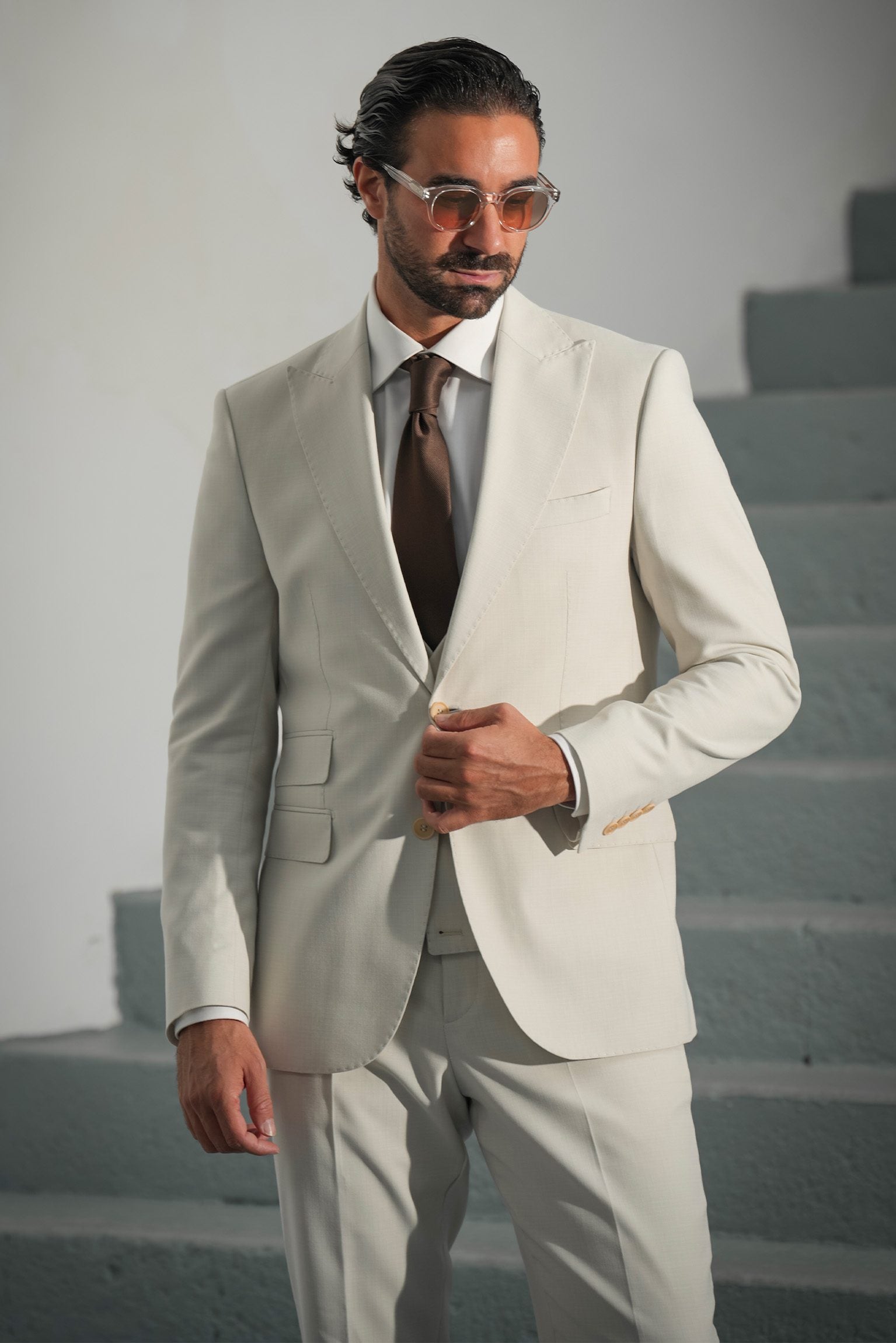 Beige three-piece microfiber suit with tailored fit