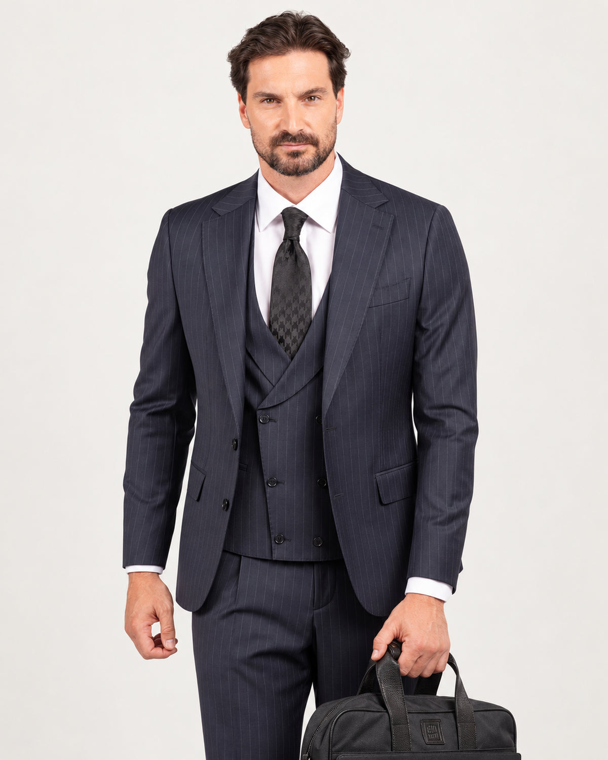Navy pinstripe slim-fit three-piece wool suit