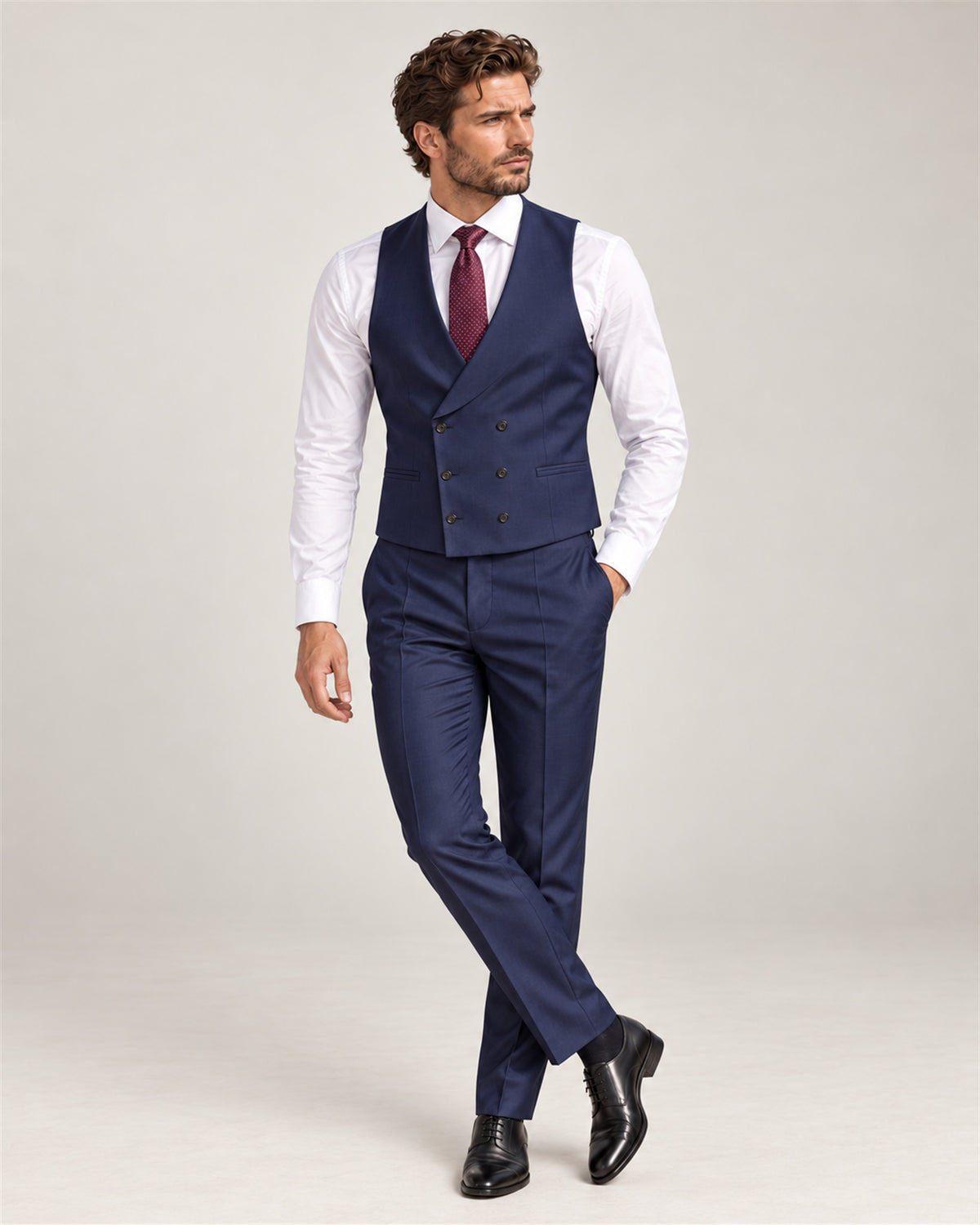 Navy slim-fit three-piece Super 130S wool suit – waistcoat and trousers on model
