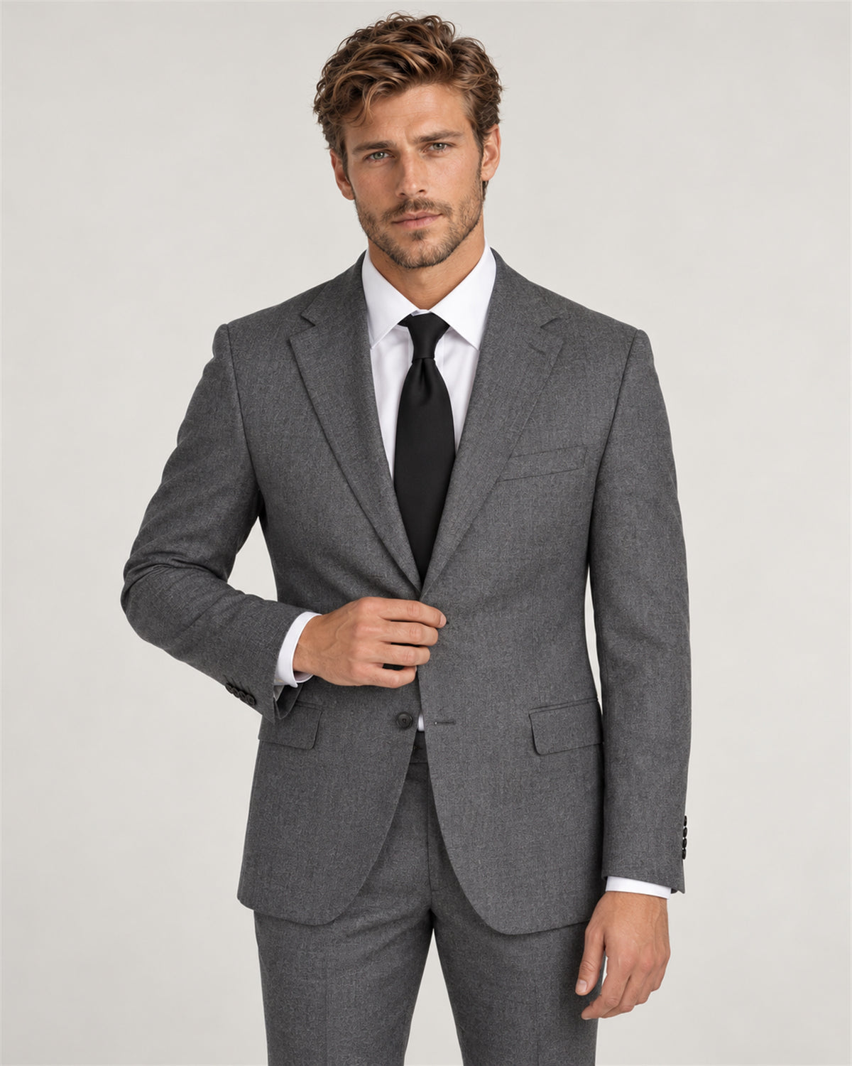 Grey tailored-fit single-breasted wool flannel suit – on model