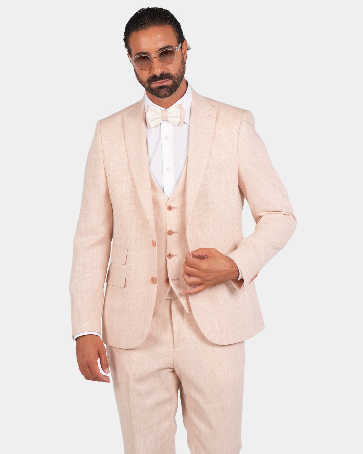 Peach slim-fit three-piece microfibre-blend suit – on model