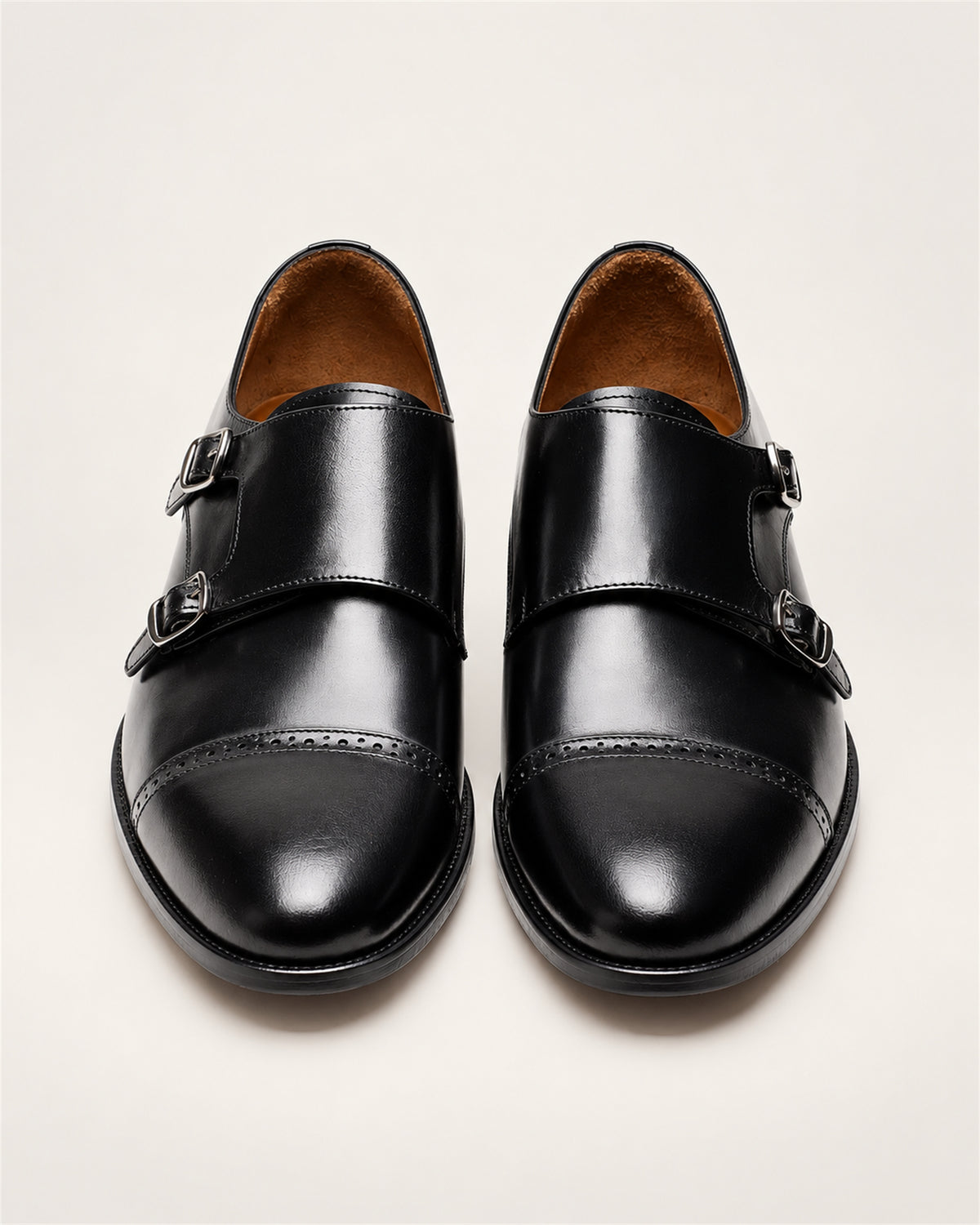 Black buffalo leather double monk strap shoes – pair of shoes from the front