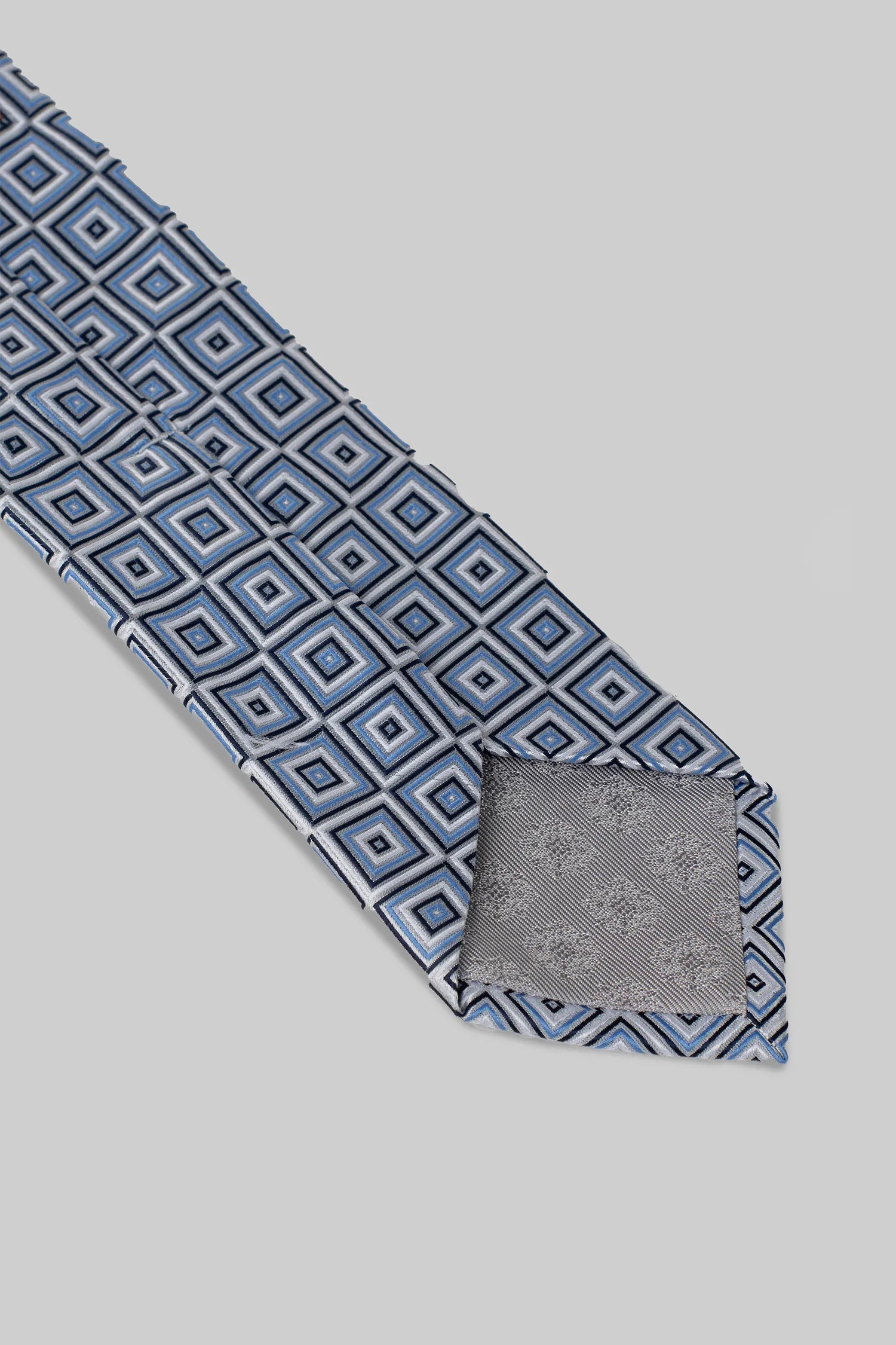 Hellblaue Krawatte mit geometrischem Muster aus Mikrofaser und passendem Einstecktuch