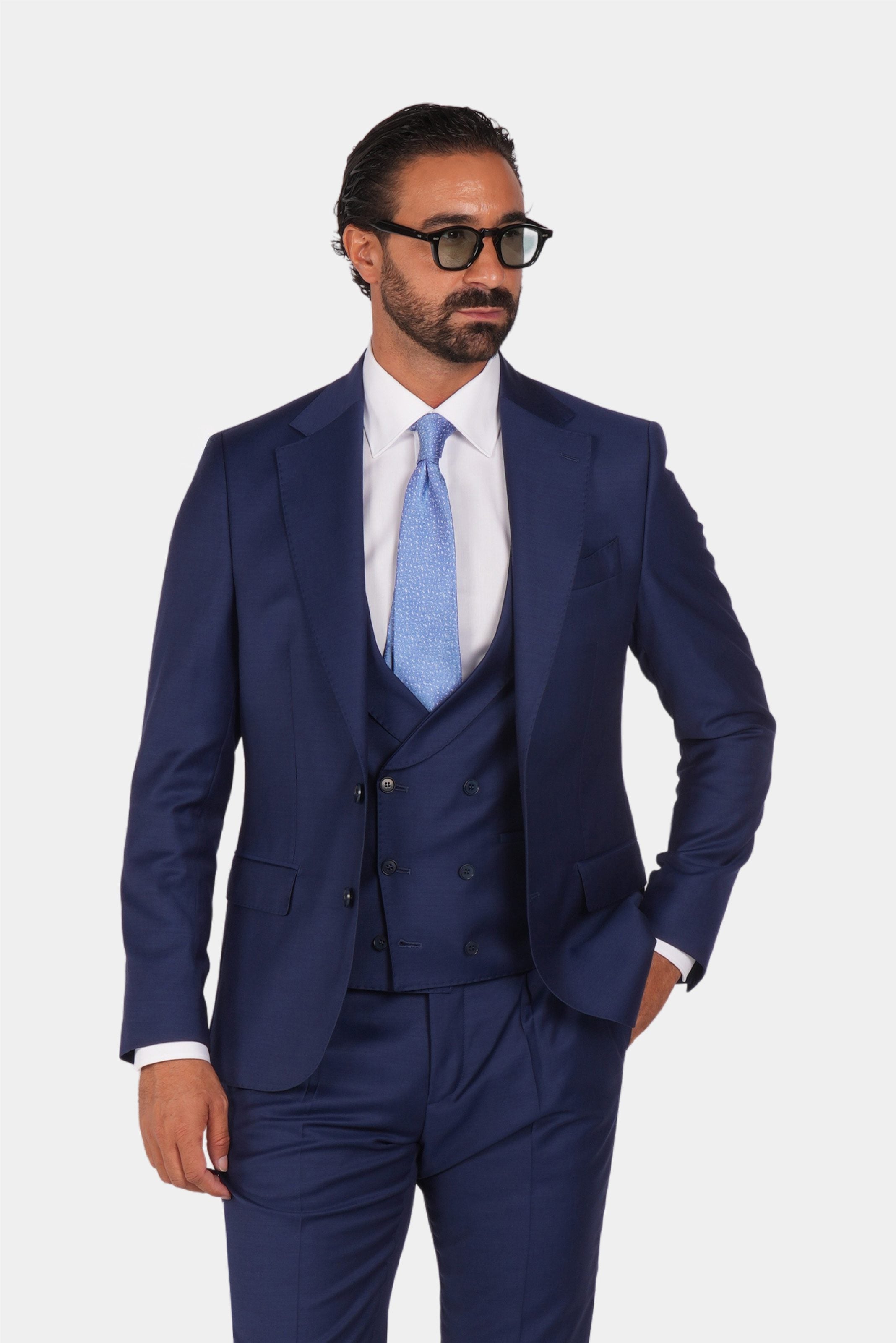 Blue slim fit three-piece wool suit