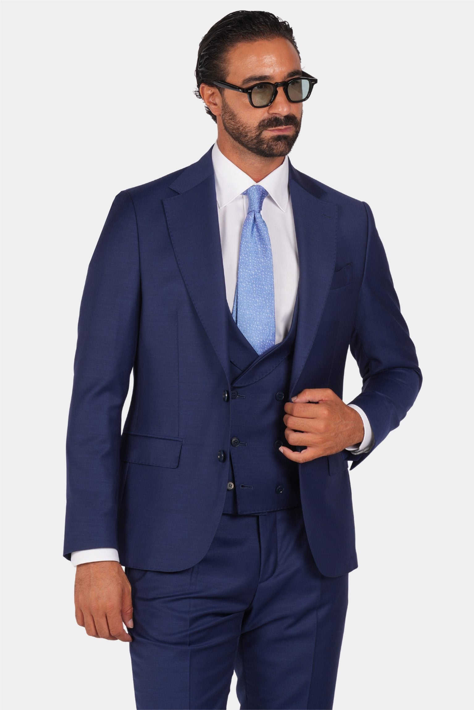 Blue slim fit three-piece wool suit