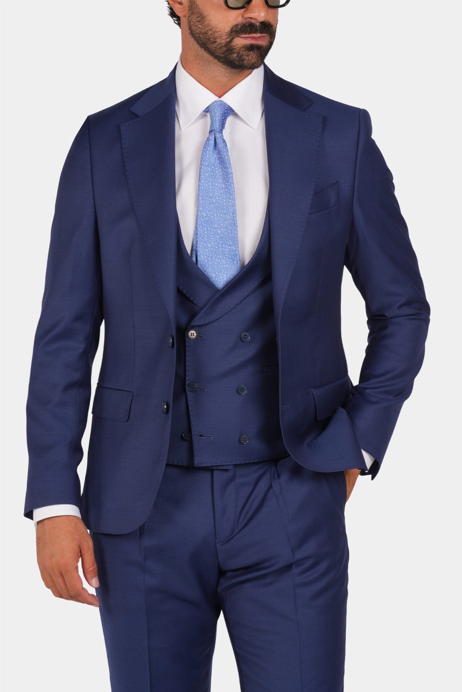Blue slim fit three-piece wool suit