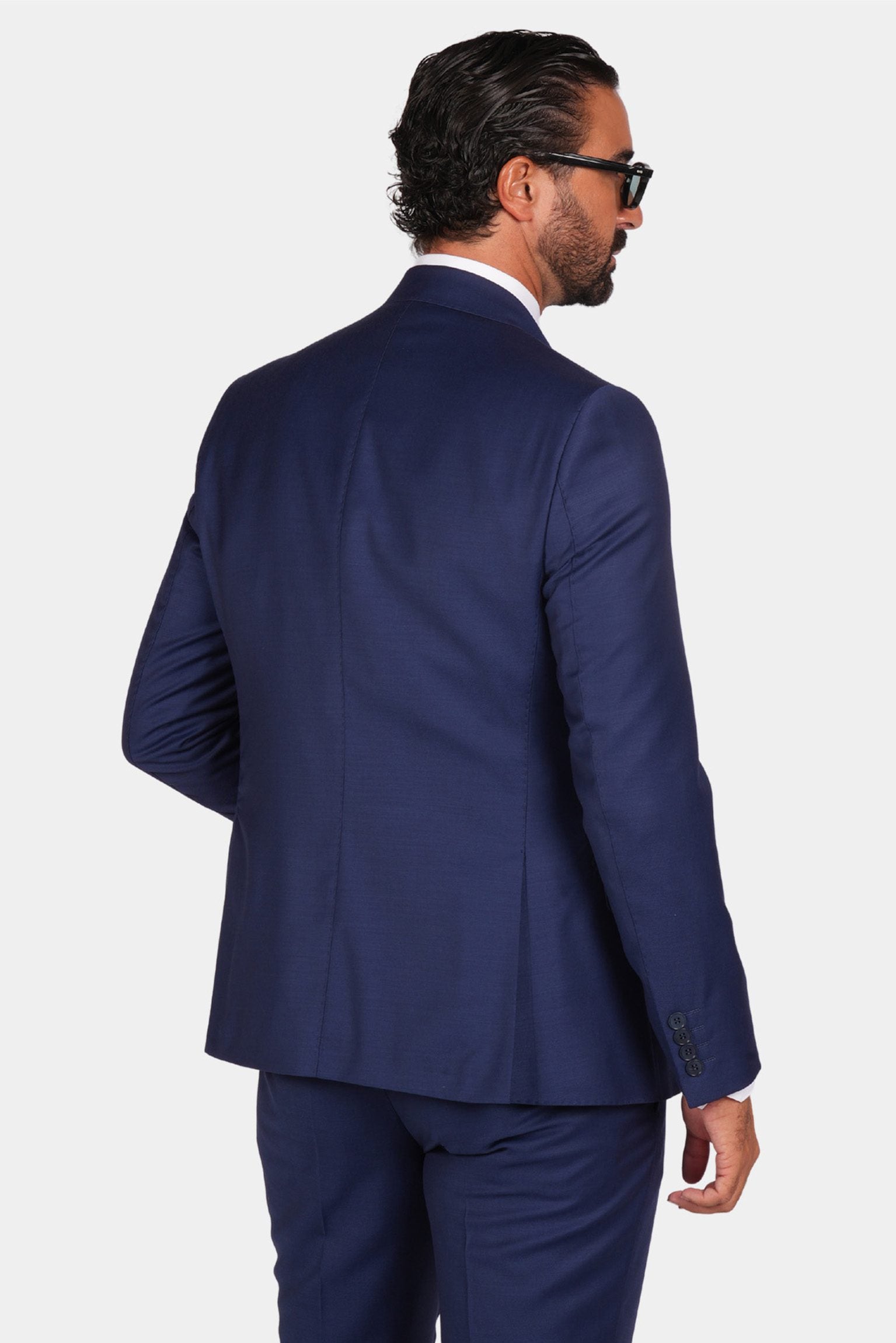 Blue slim fit three-piece wool suit