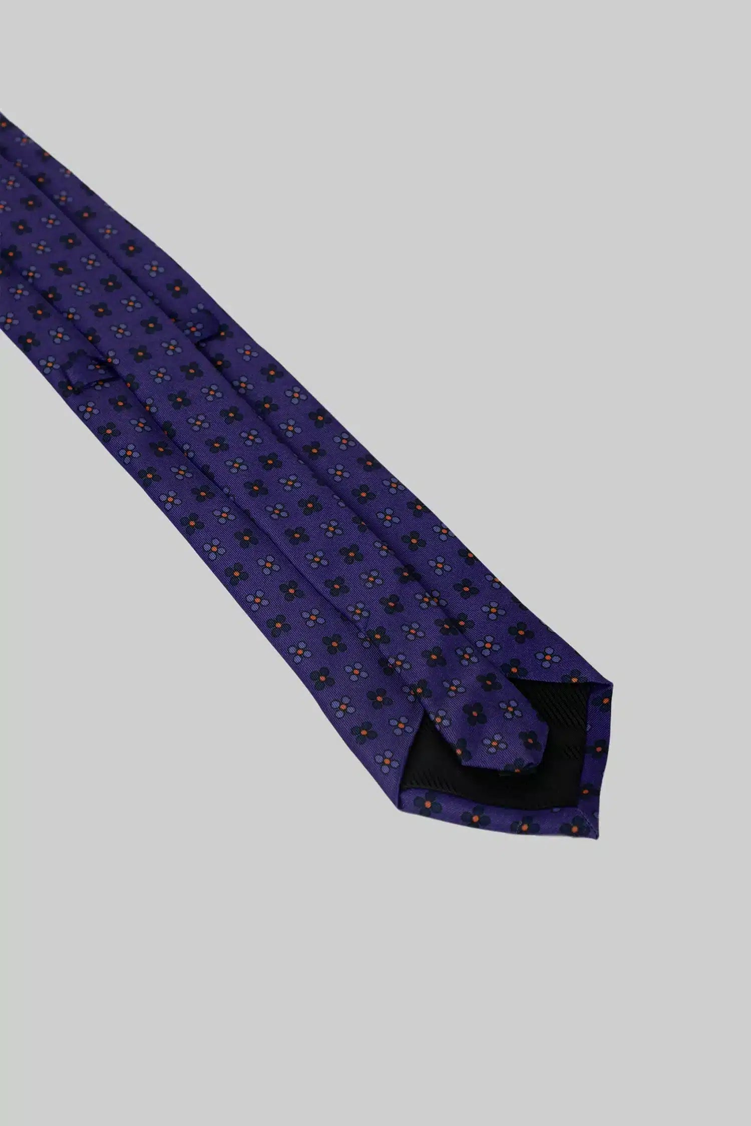 Purple tie and pocket square with floral polka dot pattern made of microfiber