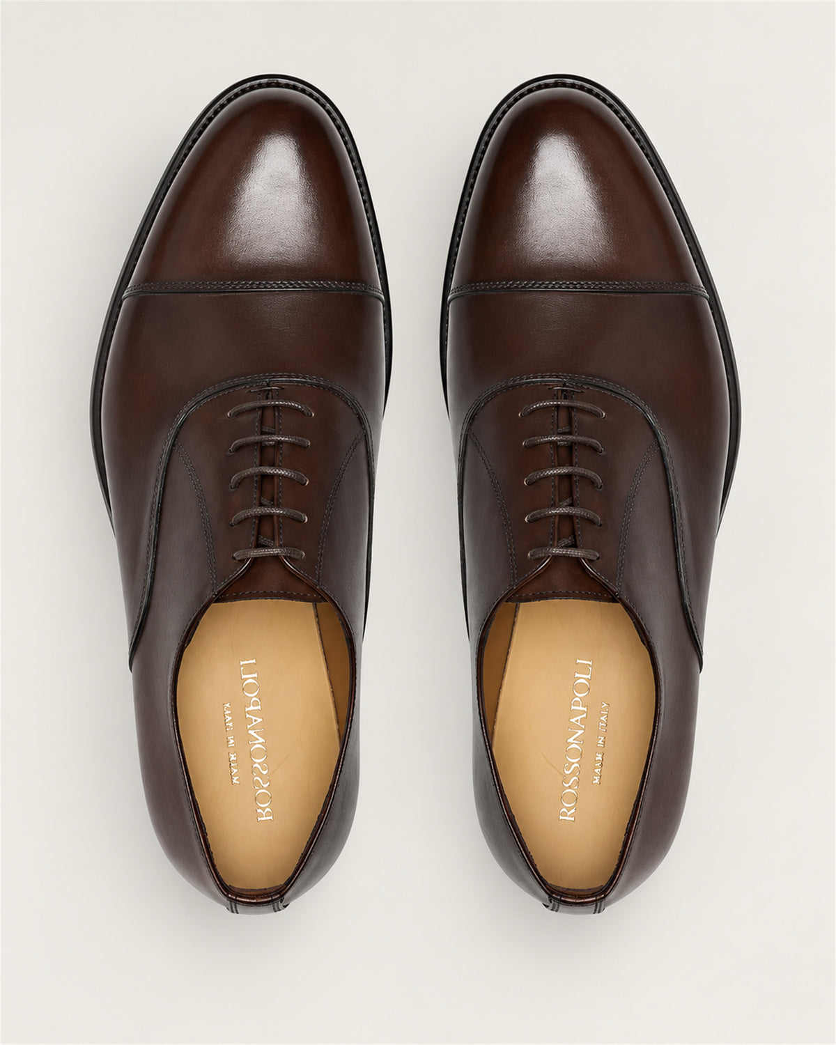 Brown Oxford cap-toe shoe made of calfskin
