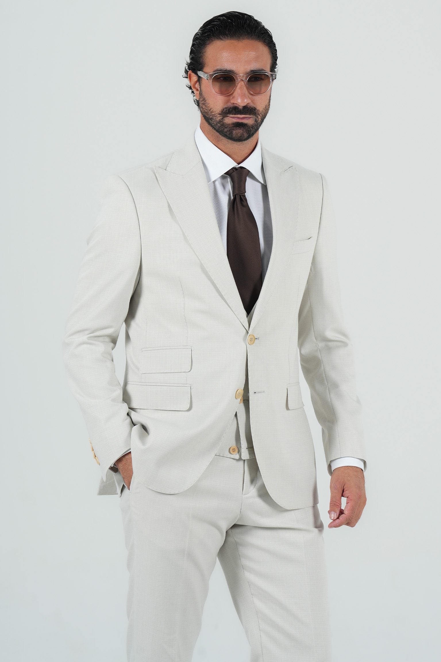 Beige three-piece microfiber suit with tailored fit