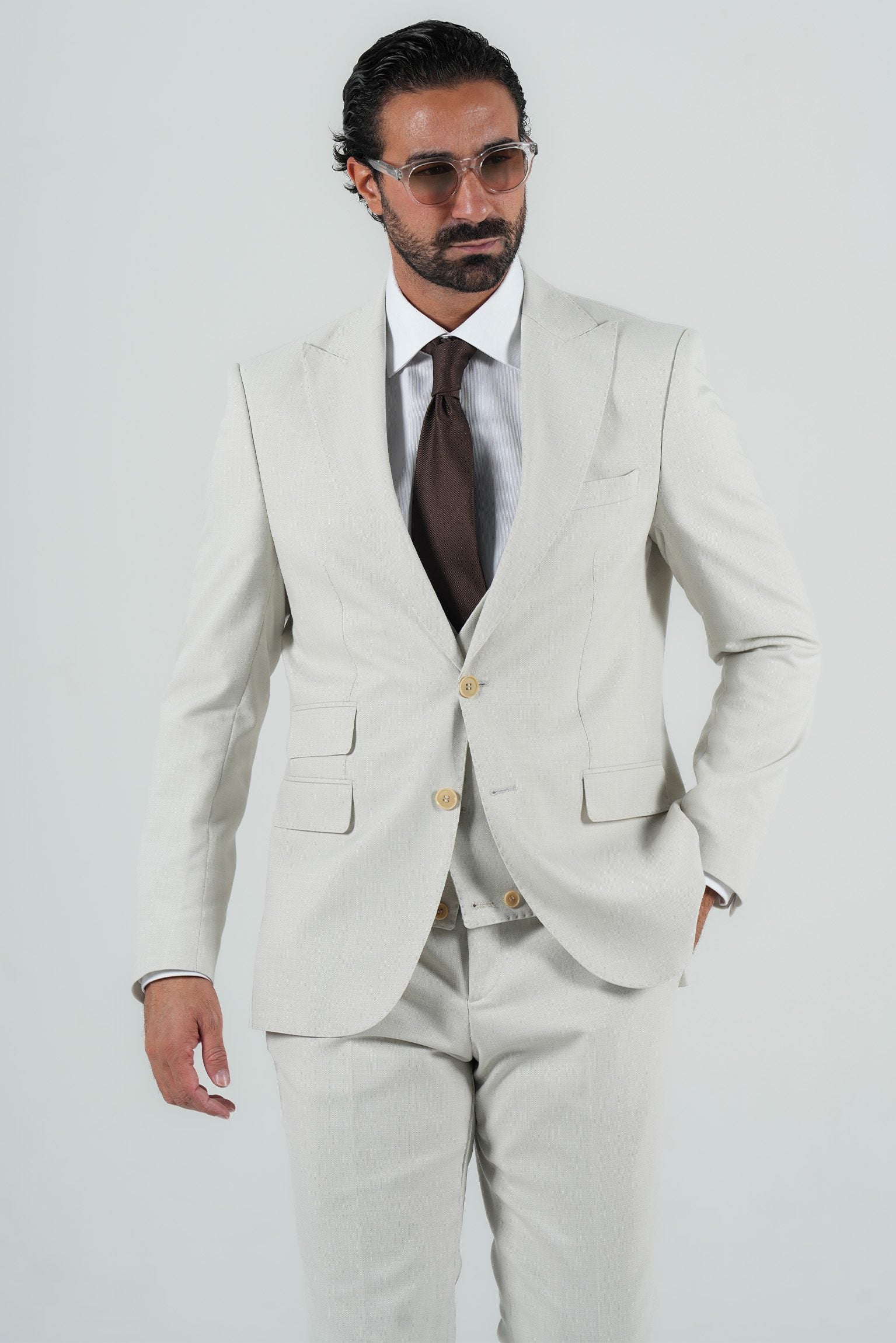 Beige three-piece microfiber suit with tailored fit