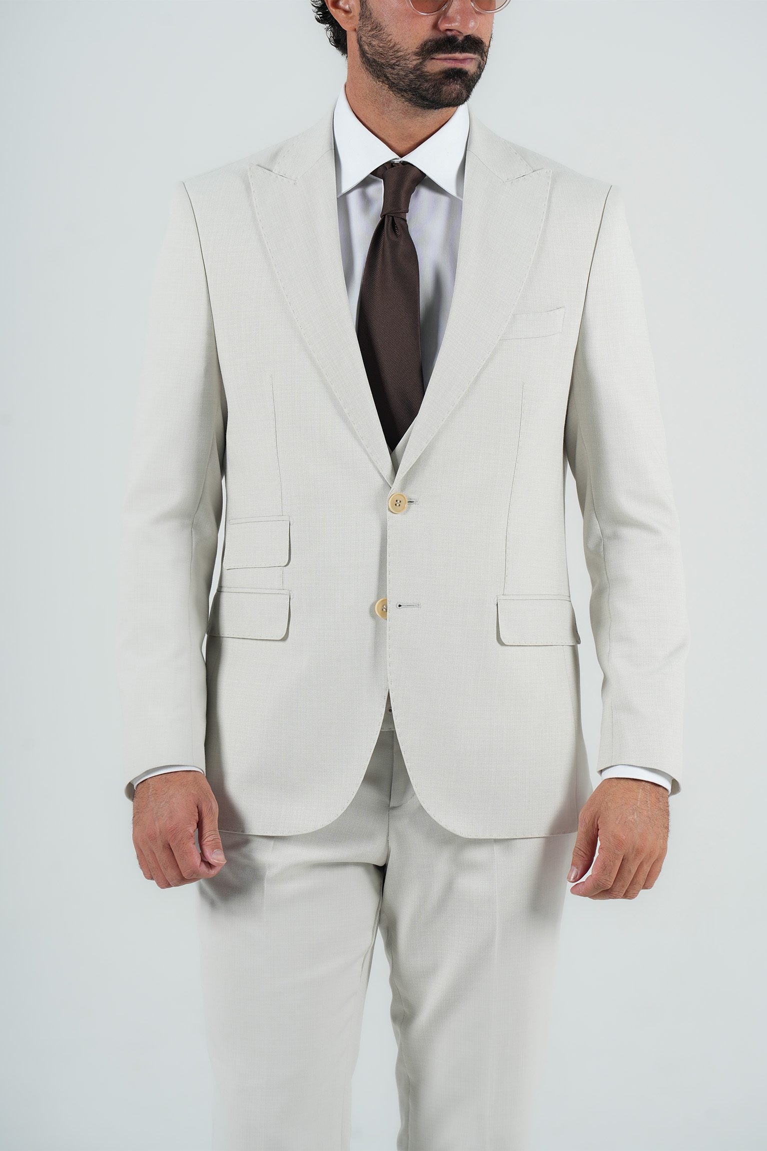 Beige three-piece microfiber suit with tailored fit