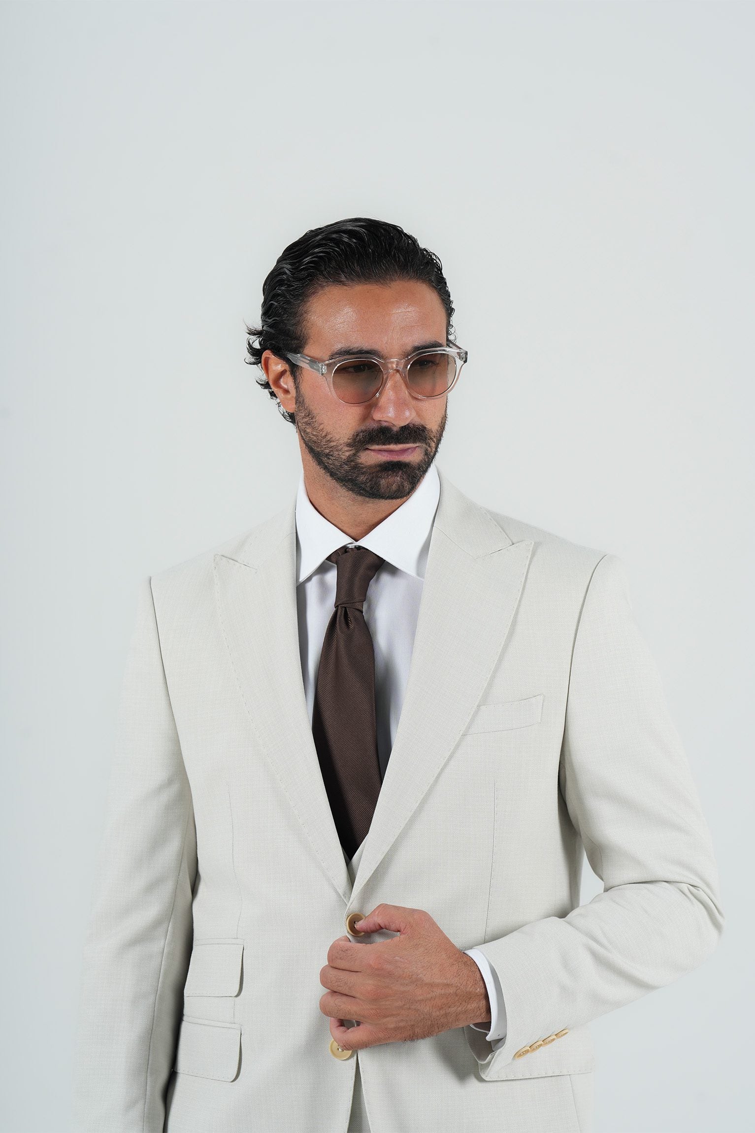 Beige three-piece microfiber suit with tailored fit