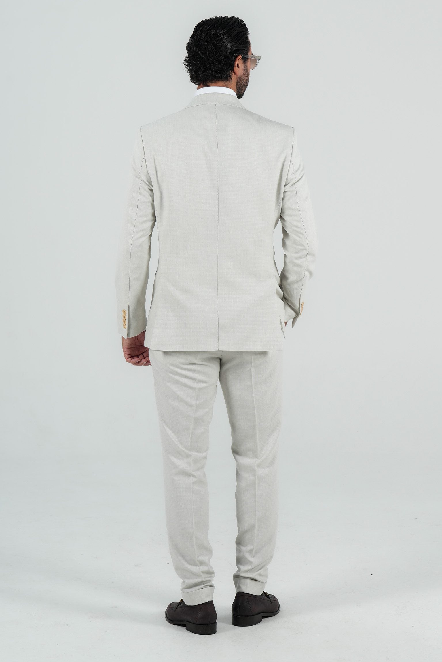 Beige three-piece microfiber suit with tailored fit