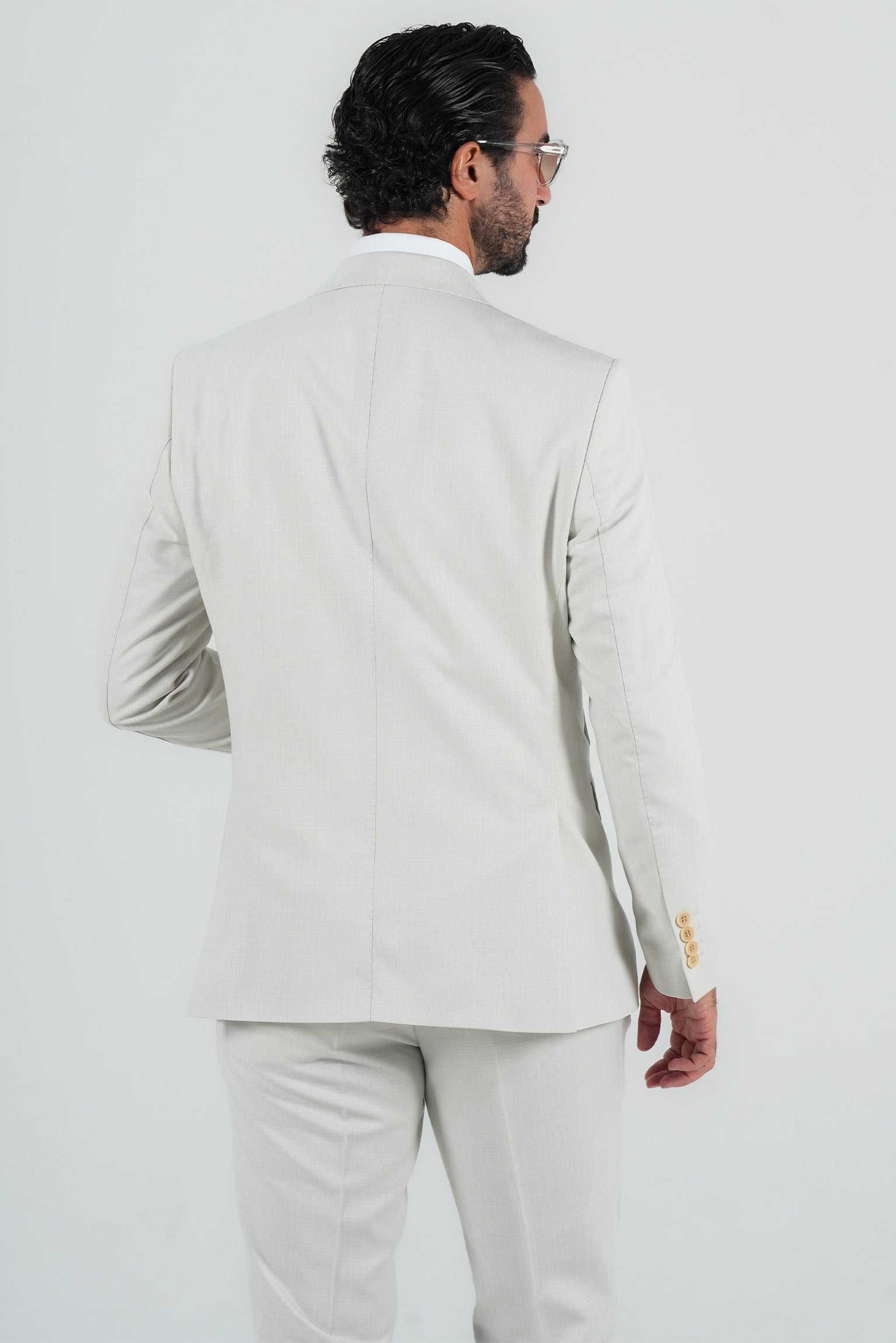 Beige three-piece microfiber suit with tailored fit
