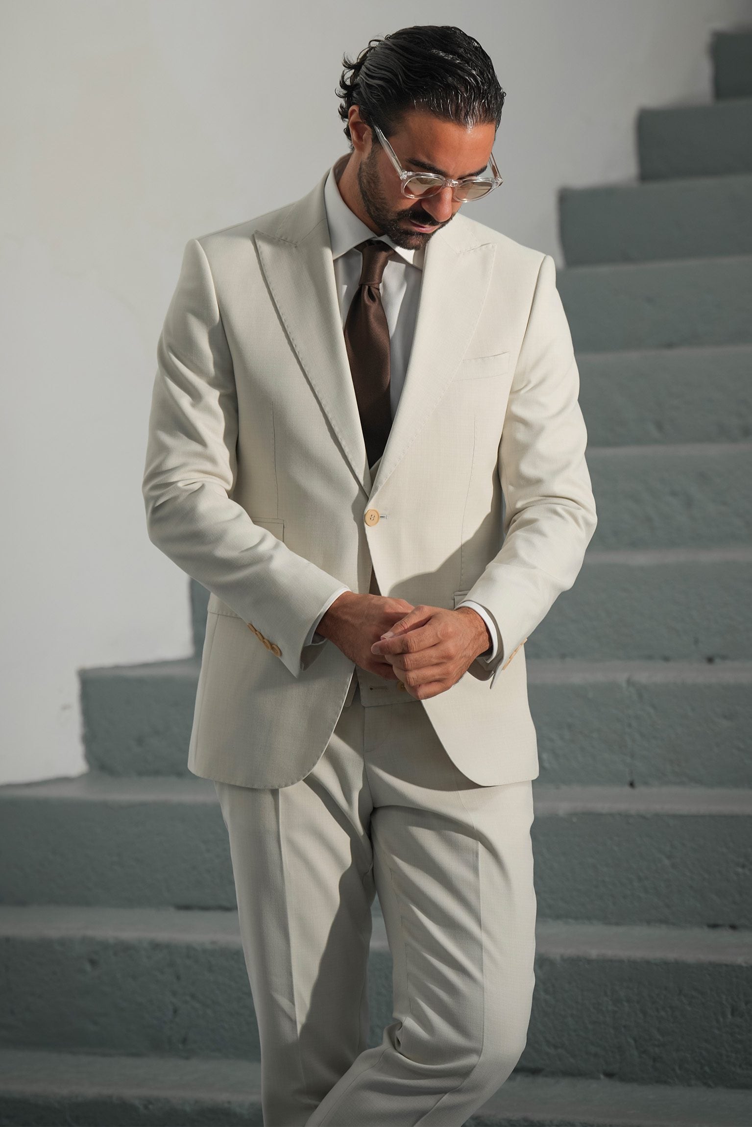 Beige three-piece microfiber suit with tailored fit
