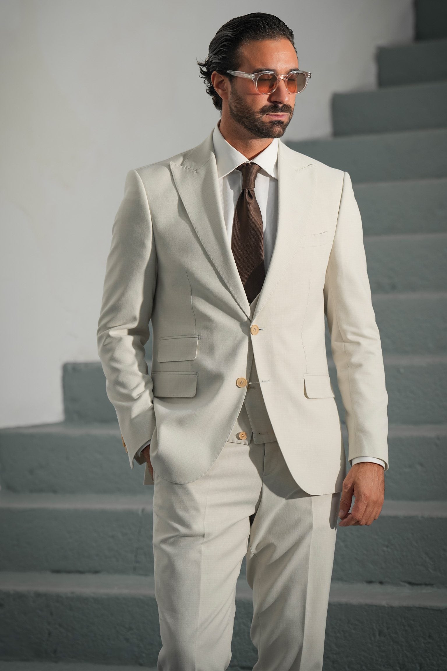 Beige three-piece microfiber suit with tailored fit