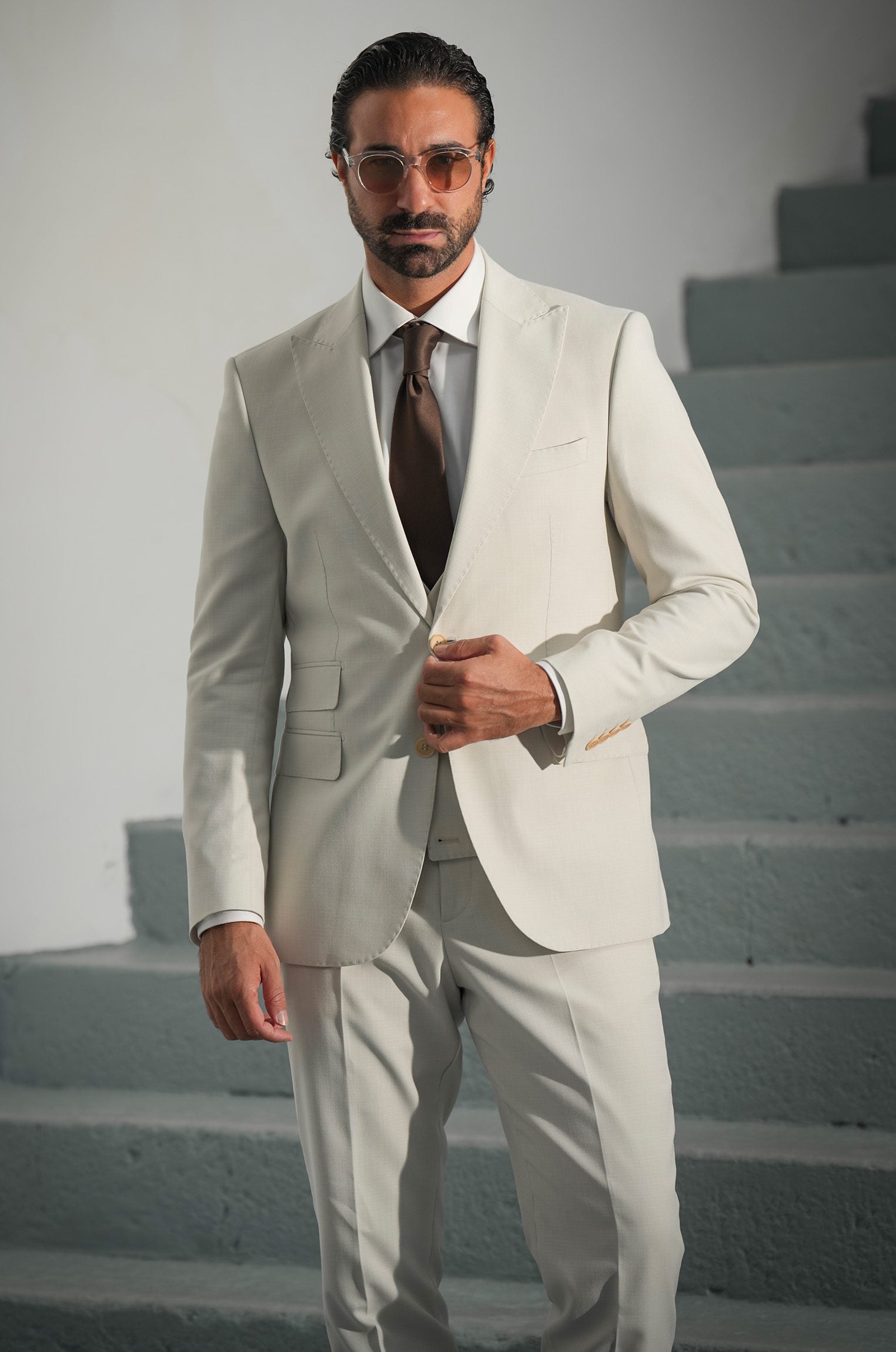 Beige three-piece microfiber suit with tailored fit
