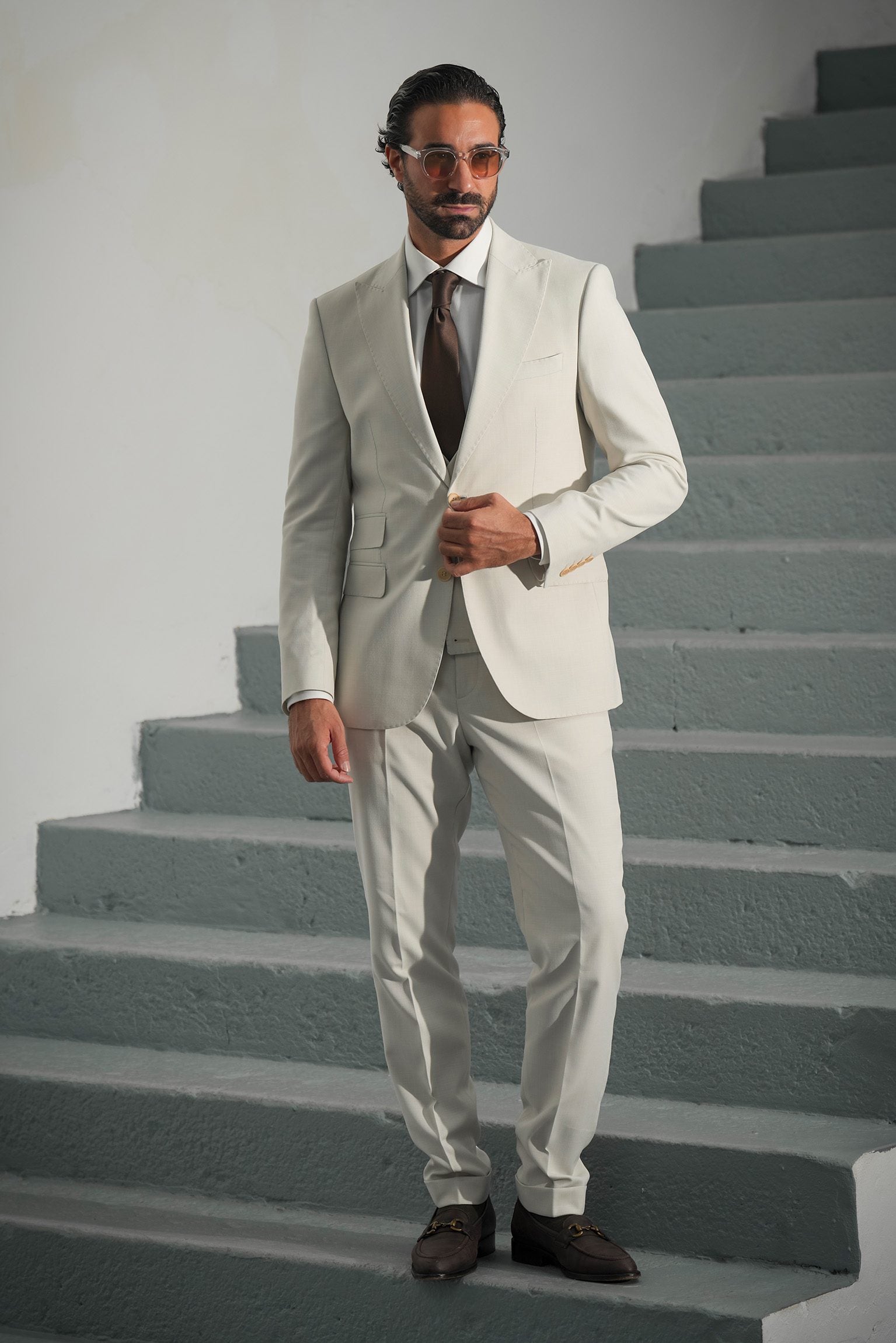 Beige three-piece microfiber suit with tailored fit