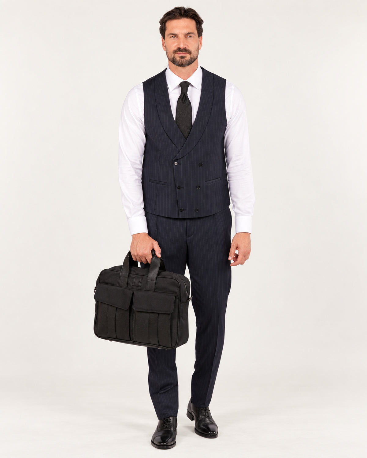 Navy pinstripe slim-fit three-piece wool suit