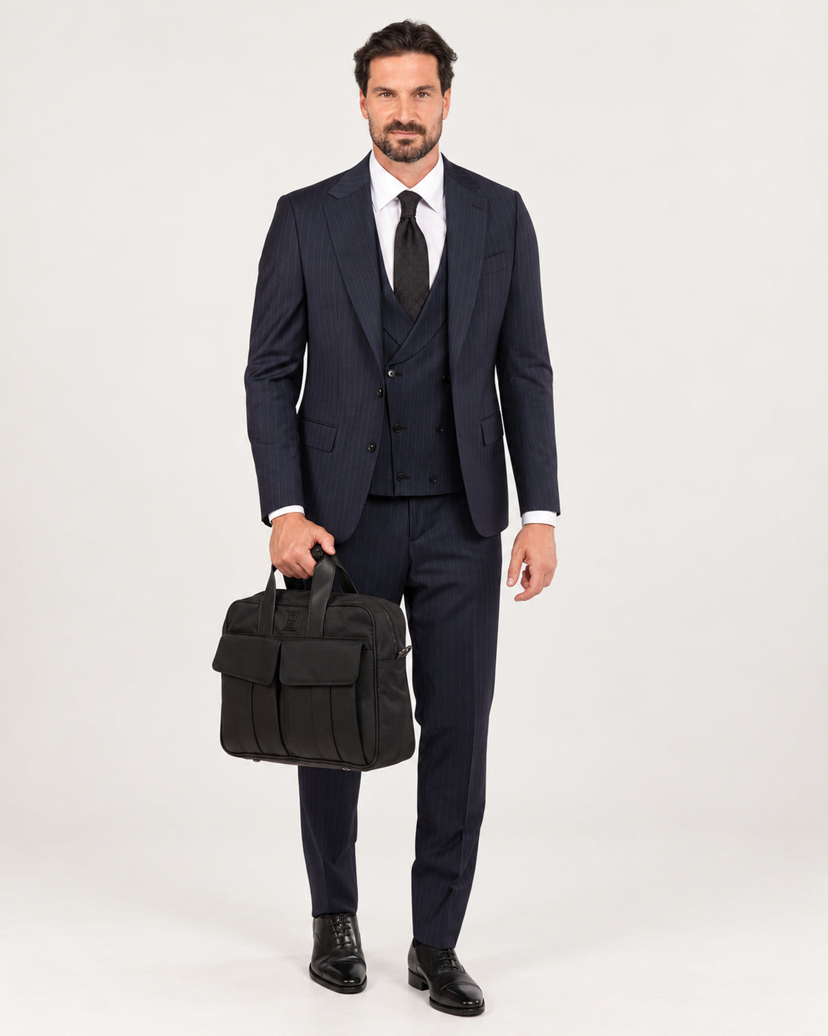 Navy pinstripe slim-fit three-piece wool suit