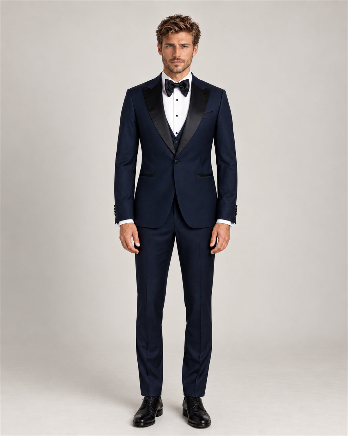 Navy three-piece wool tuxedo – full-length view on model