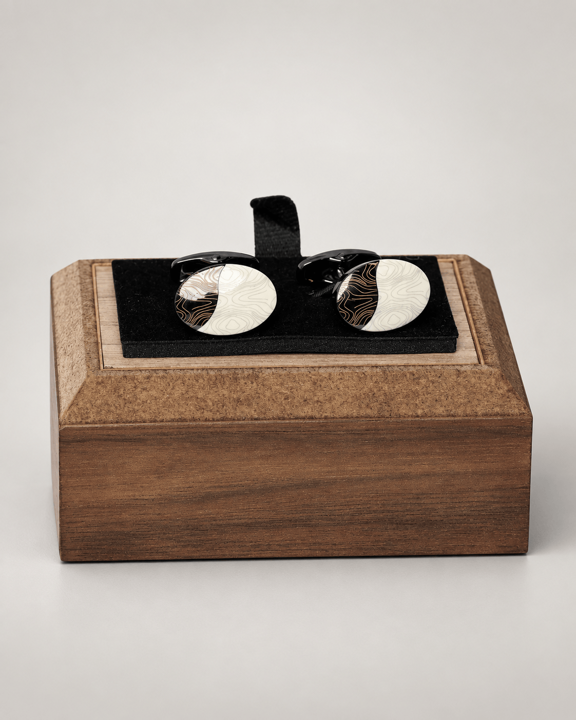 Black and white cufflinks made of Italian metal, oval design