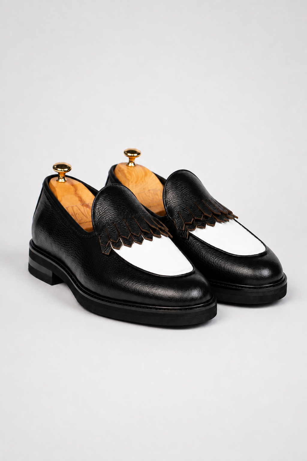 Black calfskin kiltie loafer shoes