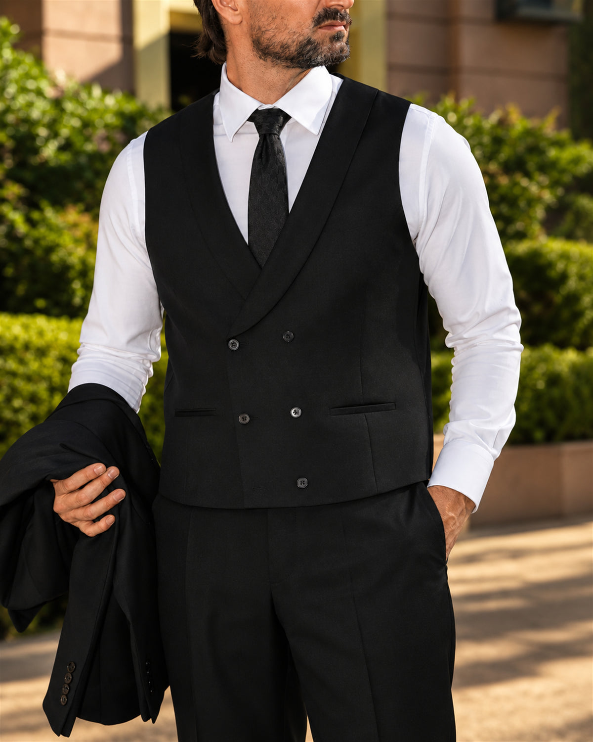 Black slim-fit wool suit with single-breasted jacket