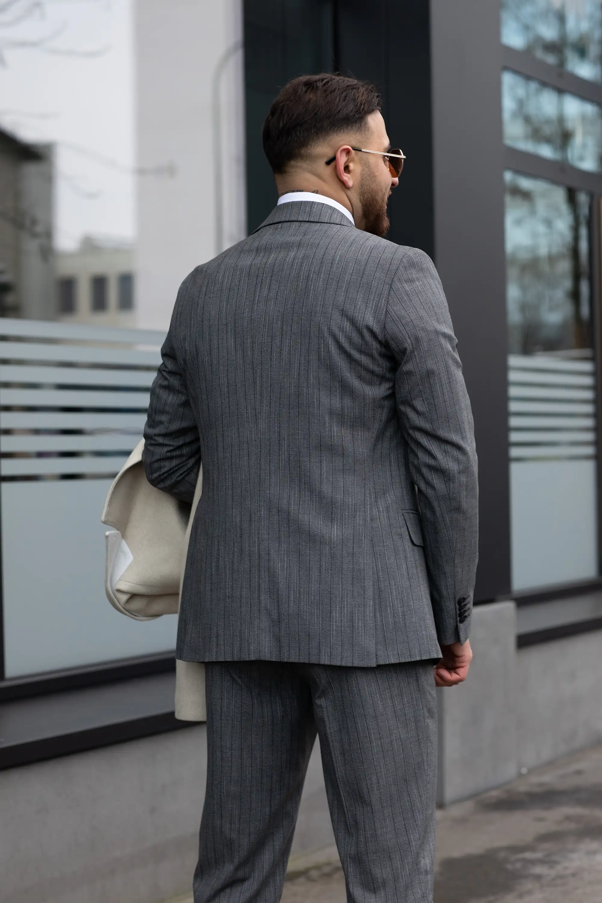 Three piece pinstripe gray suit