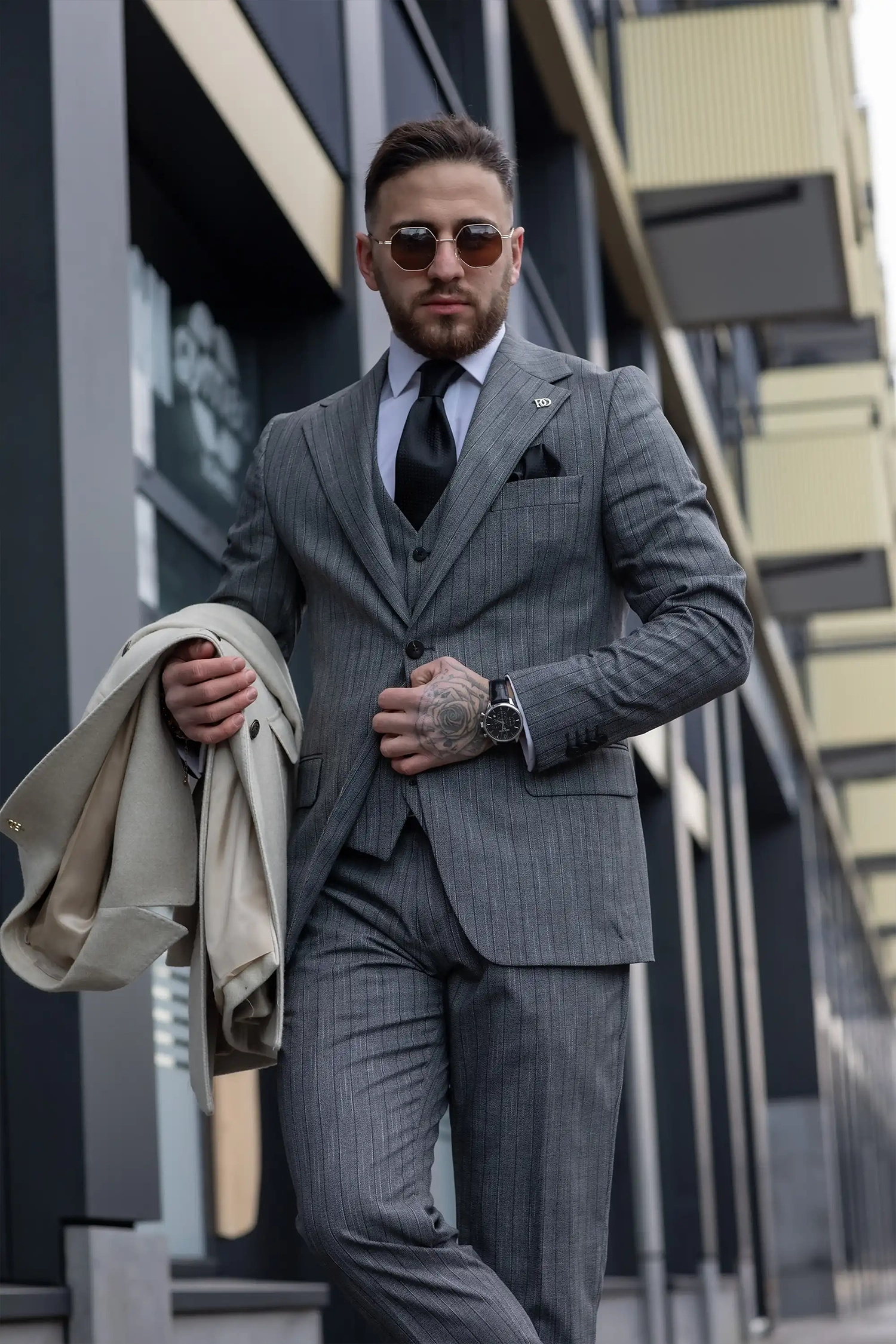 Three piece pinstripe gray suit