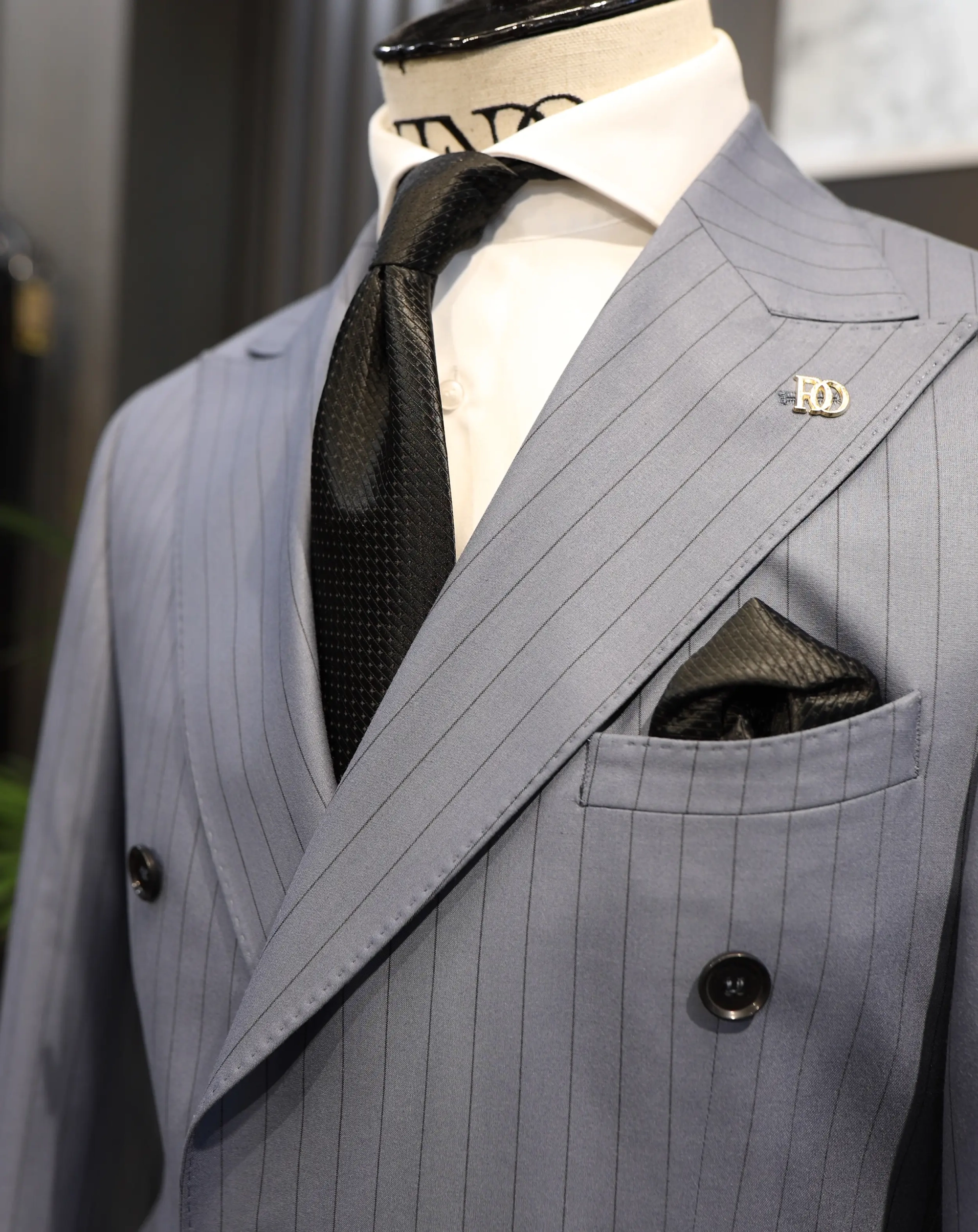 Bischofszell sky blue double breasted suit with black stripes