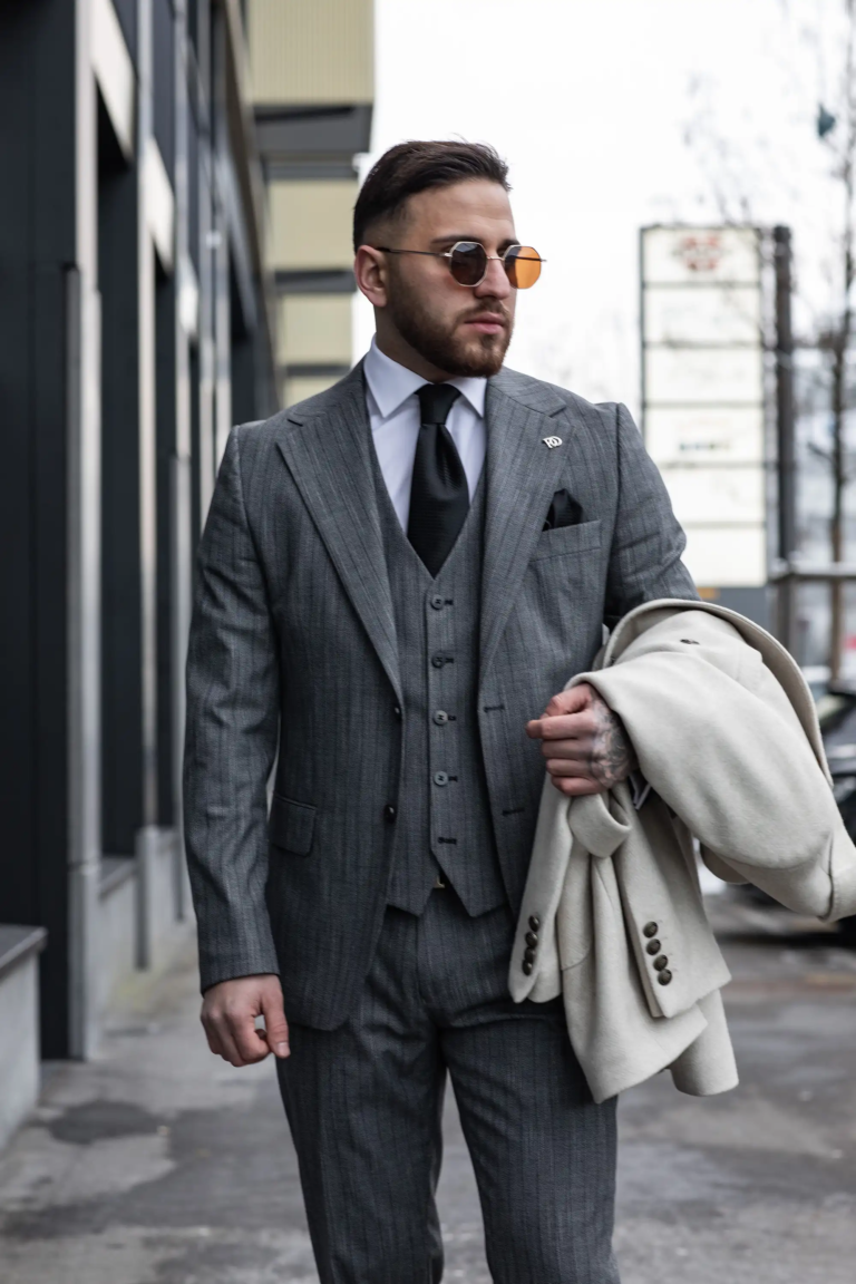 Three-piece gray suit with pinstripes