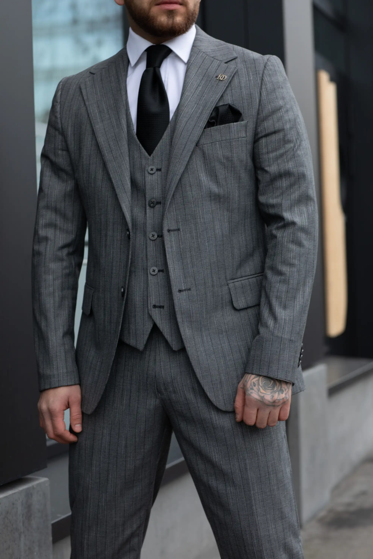 Three-piece gray suit with pinstripes